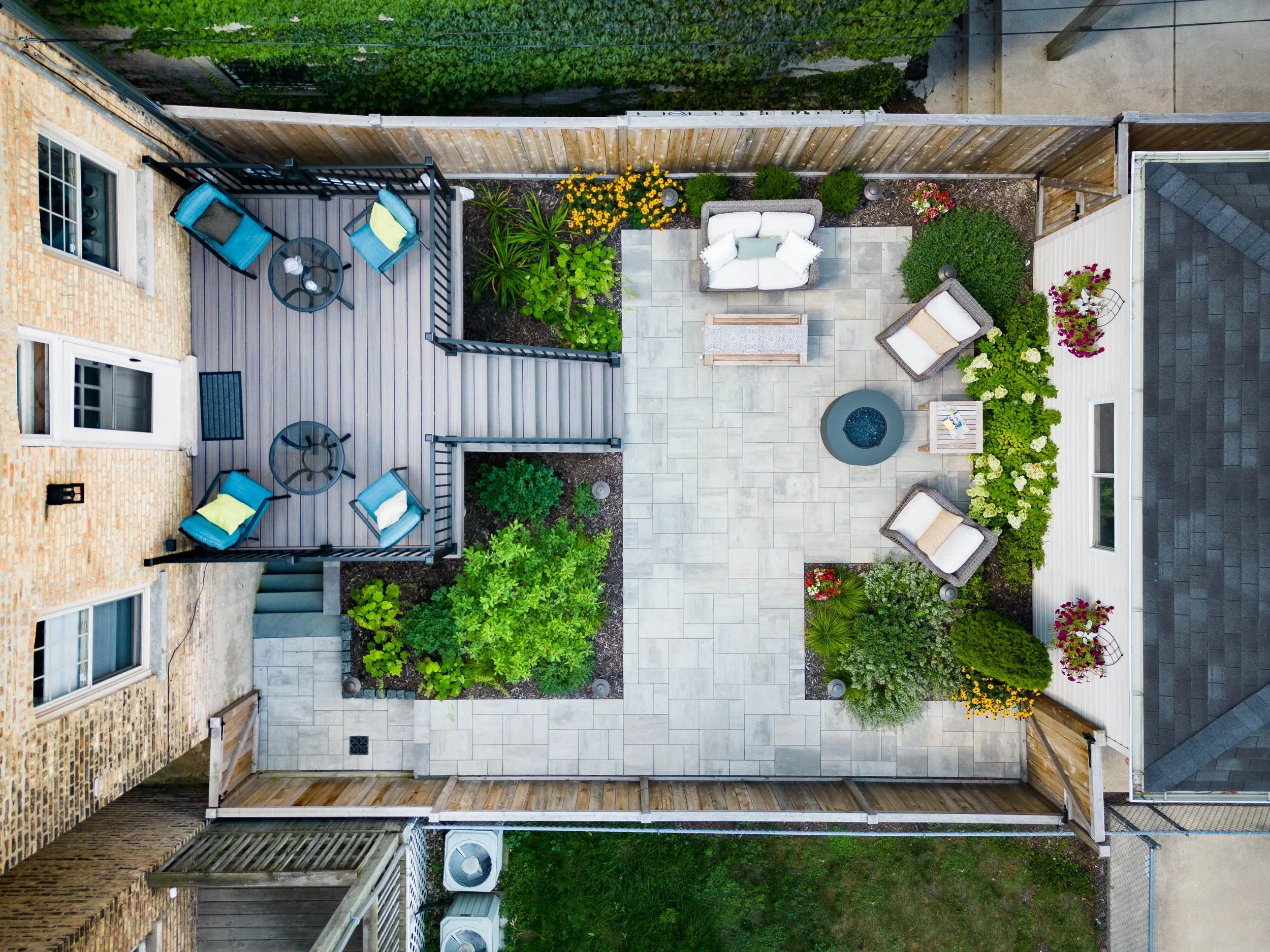 We provide a range of landscape services including Hardscapes, Outdoor Kitchens, Pergolas, Seat Walls, Fire Pits, Lawns, Landscape Lighting, Water Features, Custom Screening, Planting, Drainage Solutions, Holiday Lighting, and much more.  