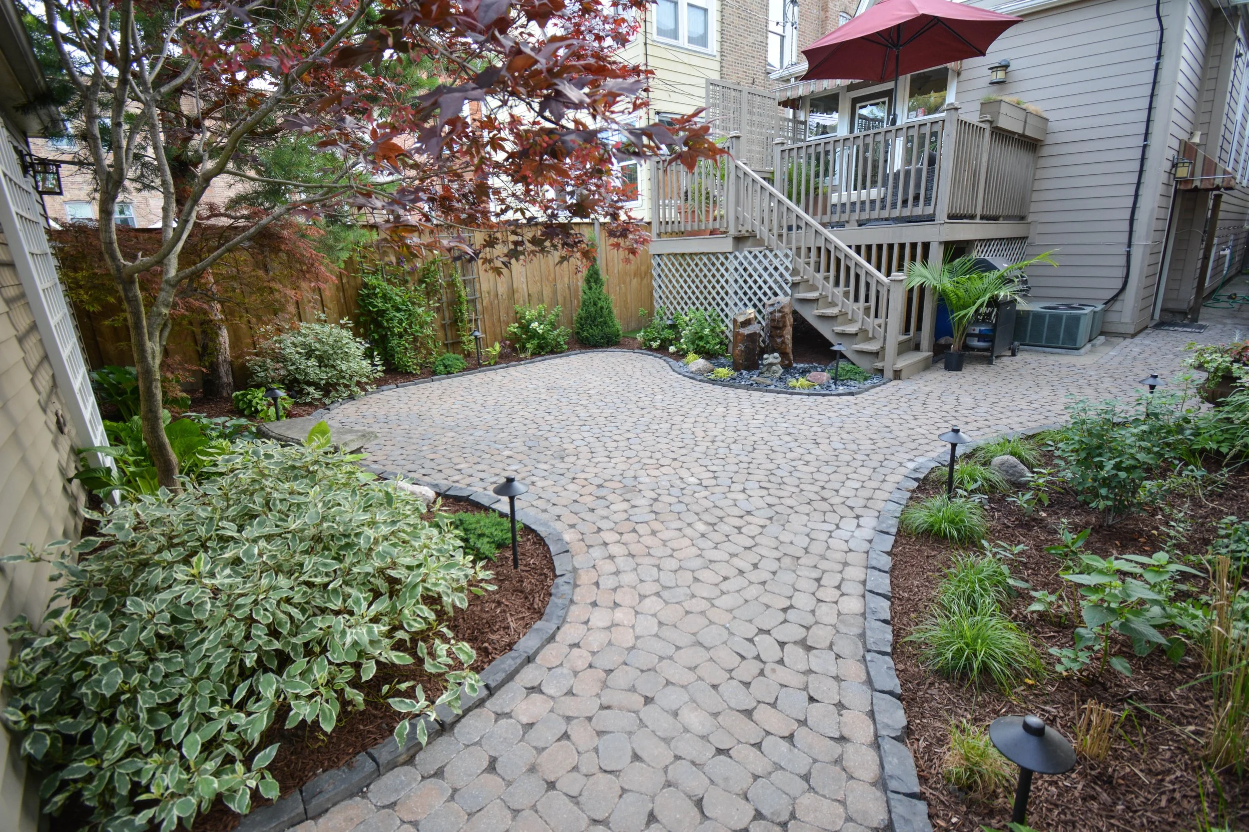 Our projects focus on executing quality hardscape and landscapes, including patios, outdoor fire pits, grilling areas, set walls, landscape lighting, pergolas, and drainage solutions.  We also offer full-service maintenance packages to keep your land