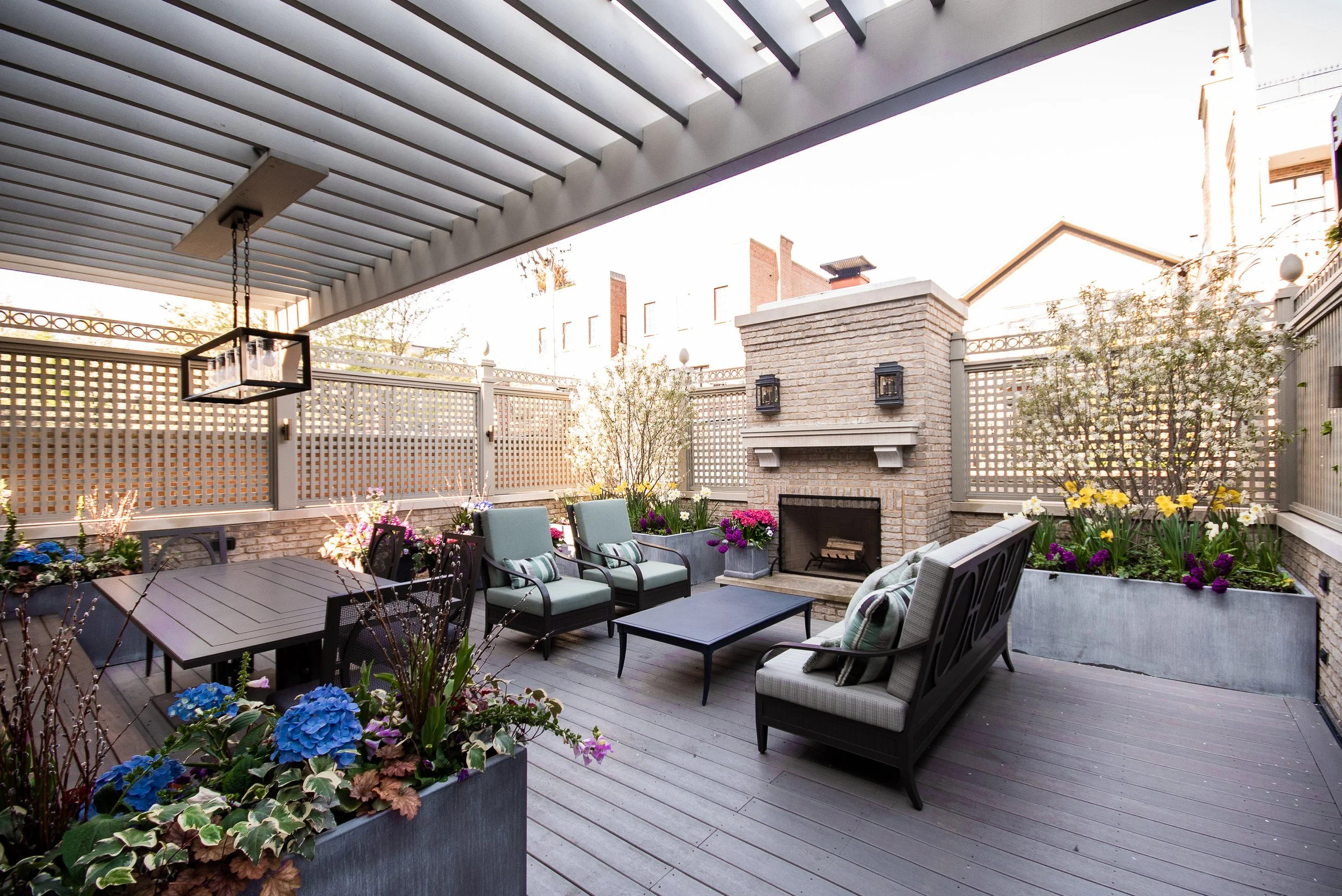 We provide a range of landscape services including Hardscapes, Outdoor Kitchens, Pergolas, Seat Walls, Fire Pits, Lawns, Landscape Lighting, Water Features, Custom Screening, Planting, Drainage Solutions, Holiday Lighting, and much more.  