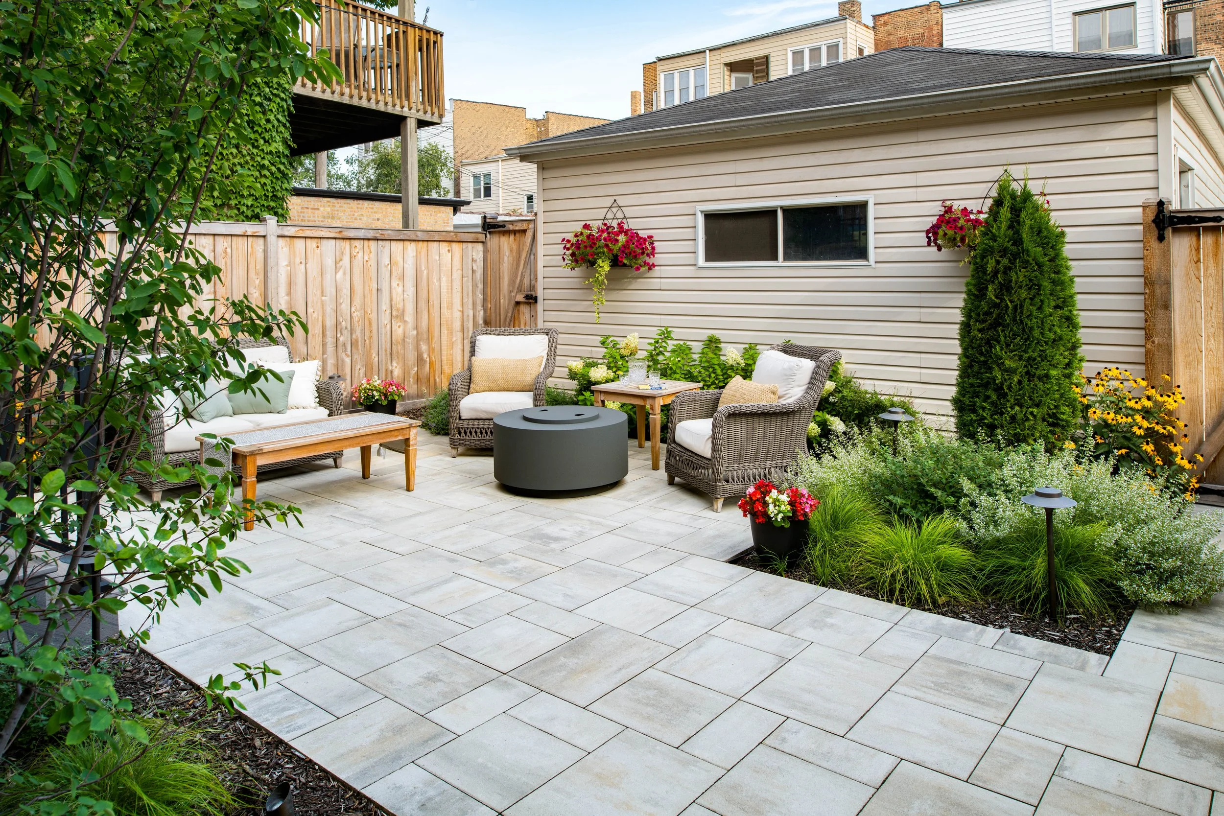 We provide a range of landscape services including Hardscapes, Outdoor Kitchens, Pergolas, Seat Walls, Fire Pits, Lawns, Landscape Lighting, Water Features, Custom Screening, Planting, Drainage Solutions, Holiday Lighting, and much more.  