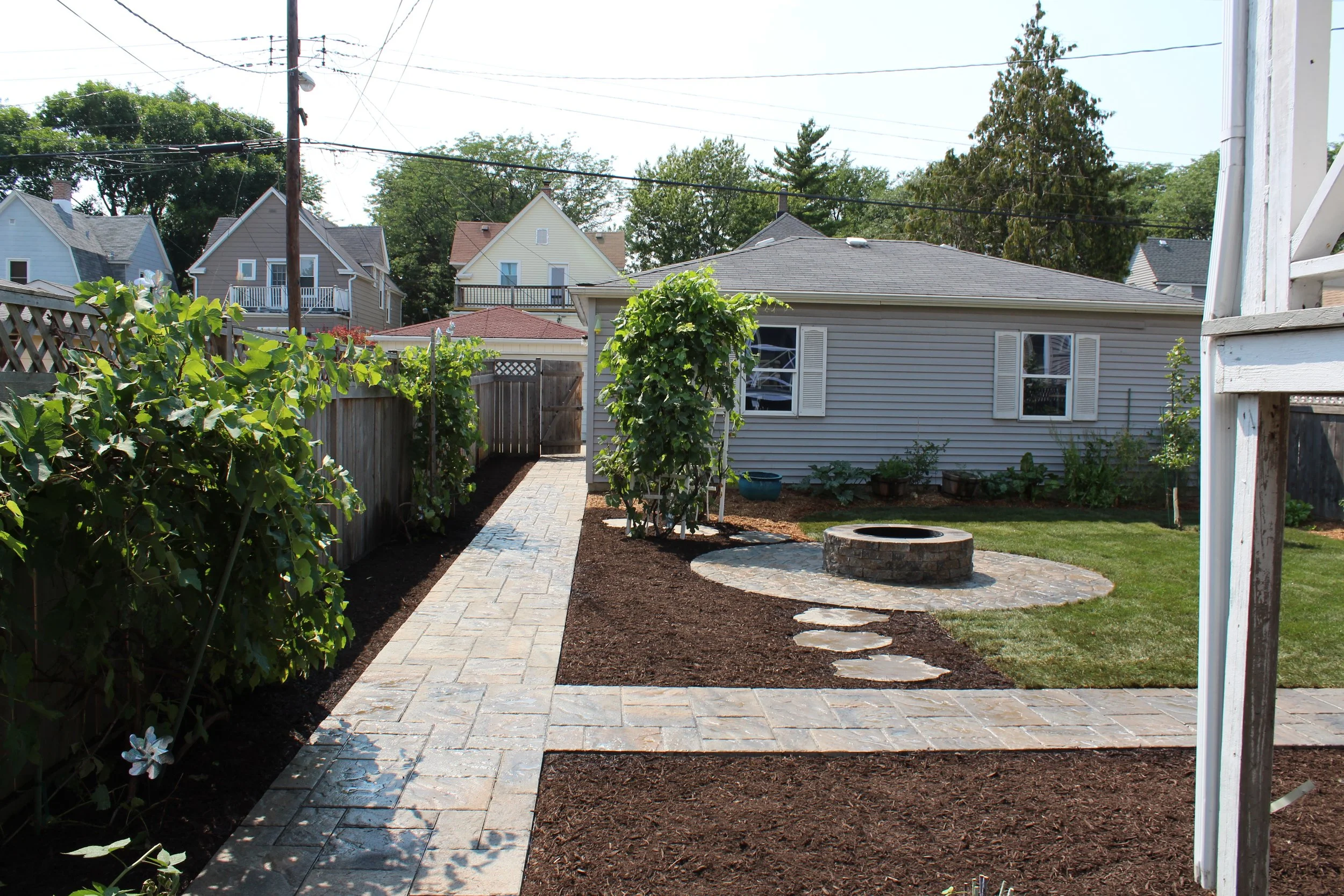 Our projects focus on executing quality hardscape and landscapes, including patios, outdoor fire pits, grilling areas, set walls, landscape lighting, pergolas, and drainage solutions.  We also offer full-service maintenance packages to keep your land