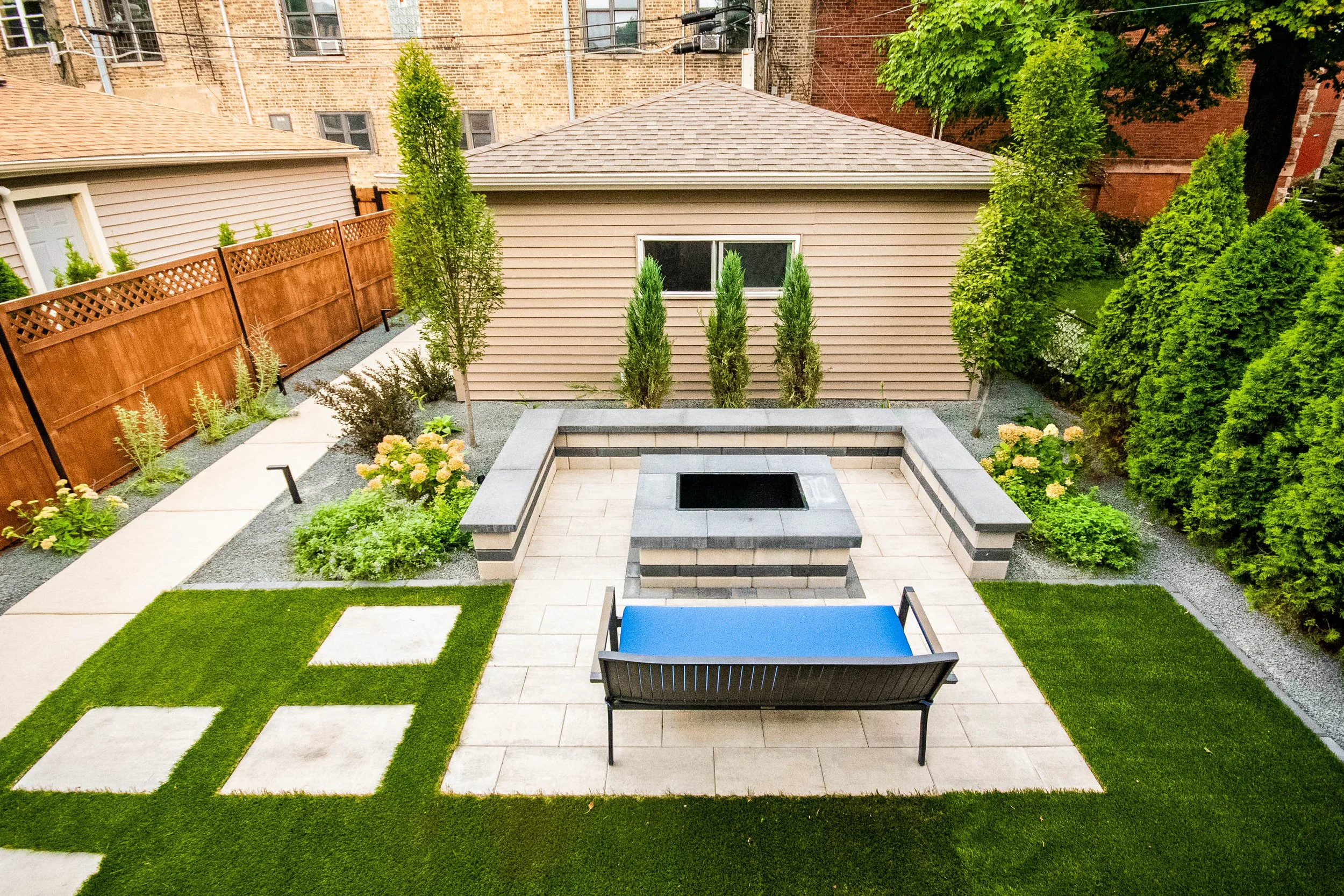 We provide a range of landscape services including Hardscapes, Outdoor Kitchens, Pergolas, Seat Walls, Fire Pits, Lawns, Landscape Lighting, Water Features, Custom Screening, Planting, Drainage Solutions, Holiday Lighting, and much more.  