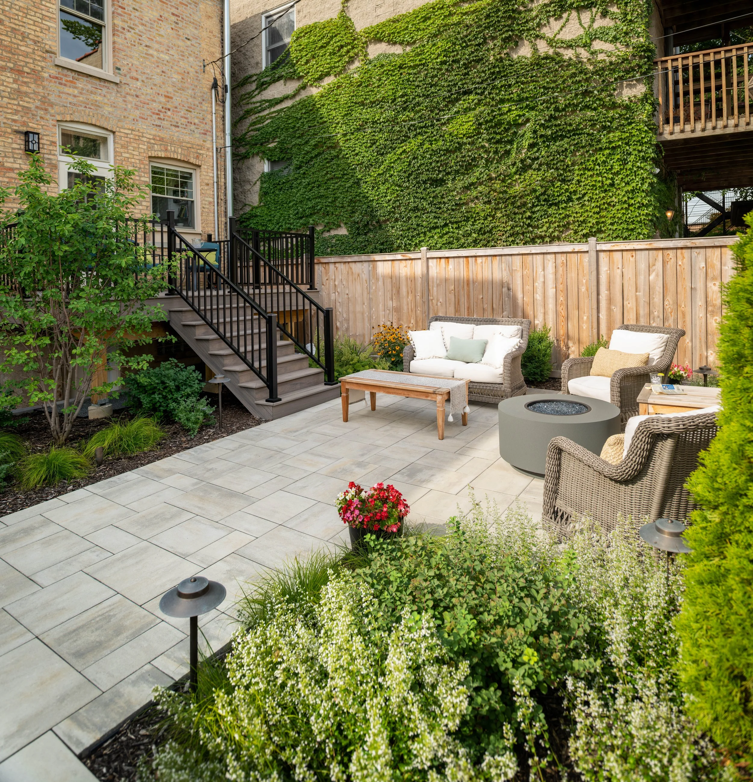 We provide a range of landscape services including Hardscapes, Outdoor Kitchens, Pergolas, Seat Walls, Fire Pits, Lawns, Landscape Lighting, Water Features, Custom Screening, Planting, Drainage Solutions, Holiday Lighting, and much more.  