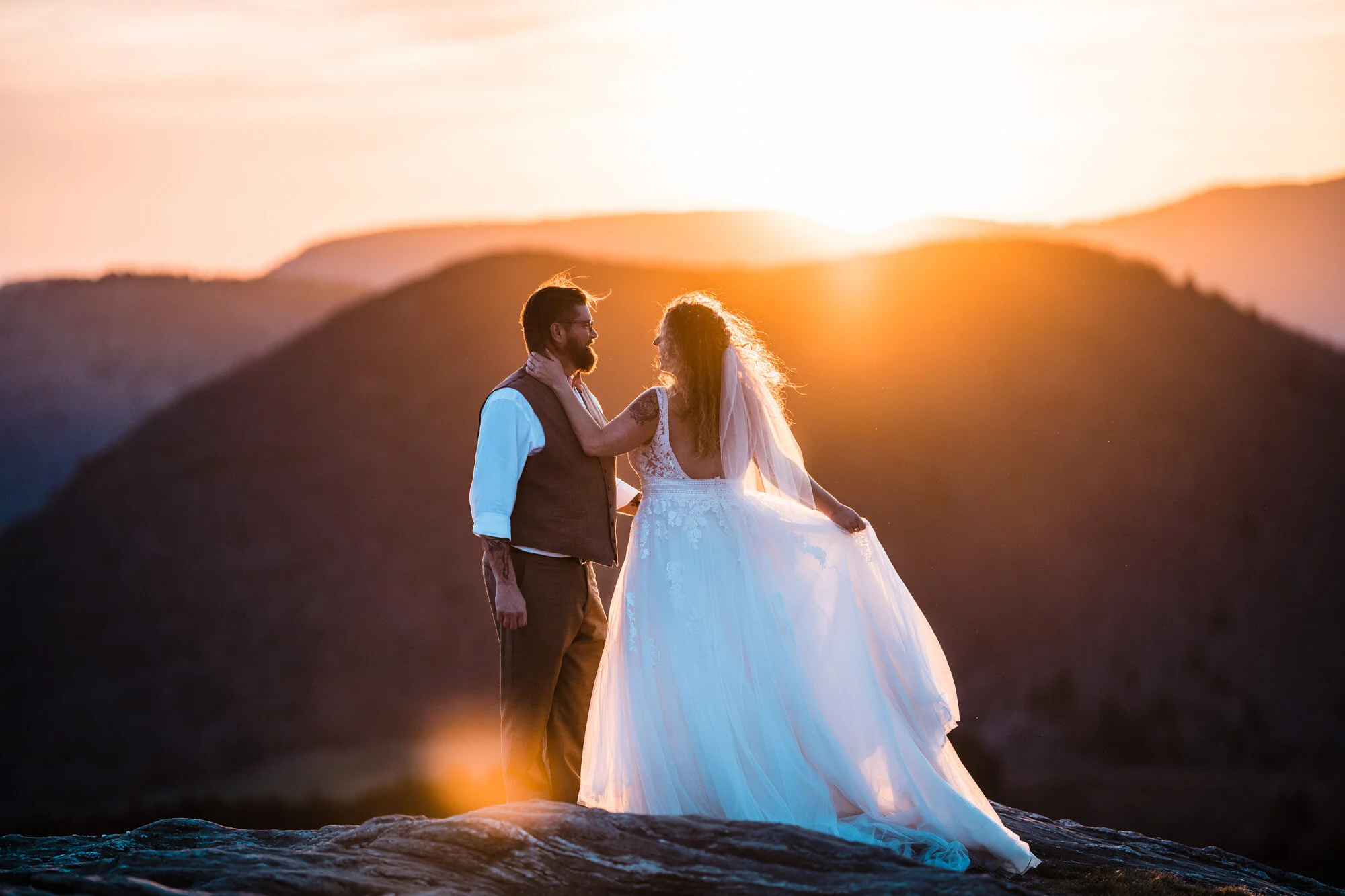 Kimb and Roland together at sunset in the Blue Ridge Mountains after their Brevard wedding