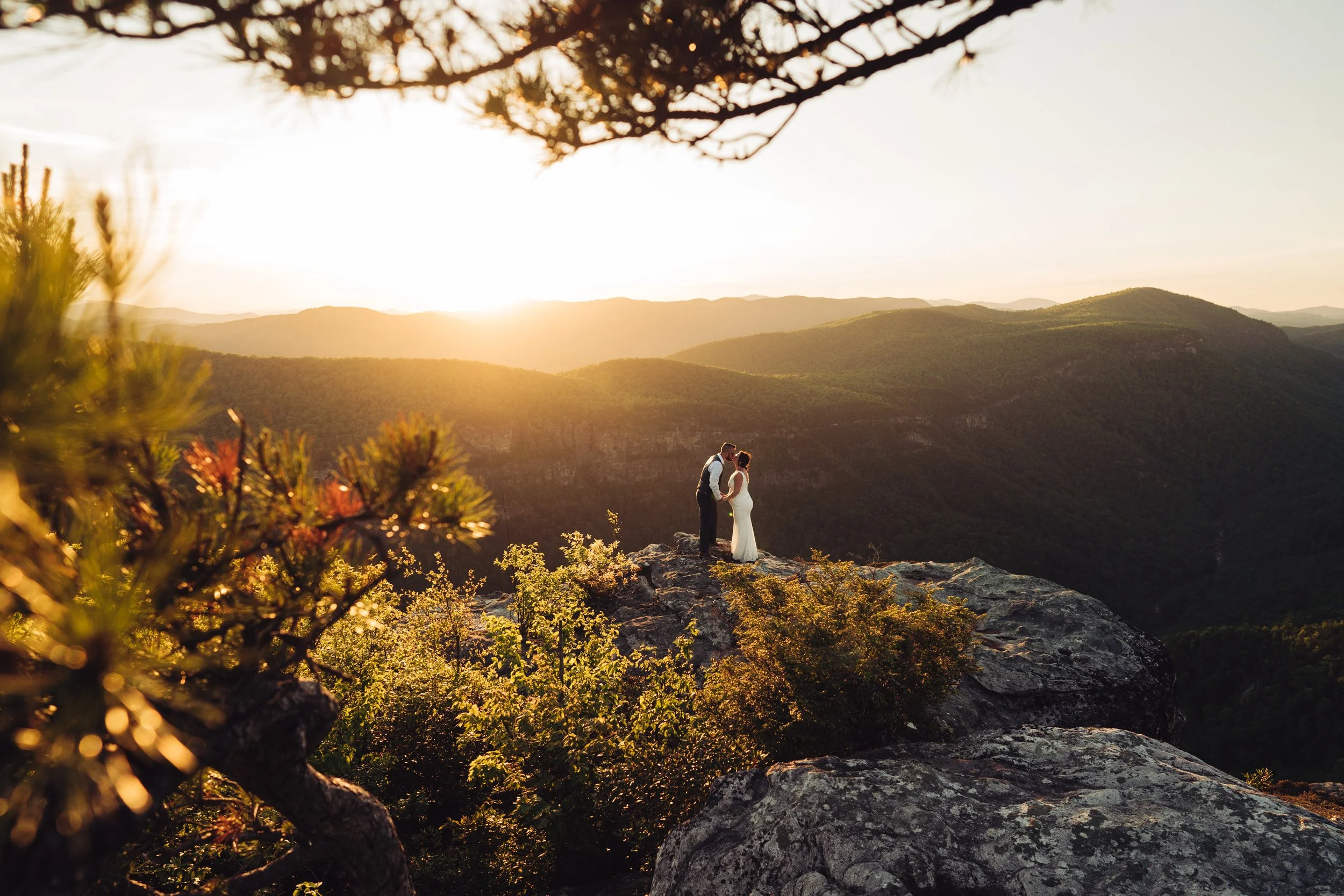Andrea and Adam together on a rocky overlook above Linville Gorge
