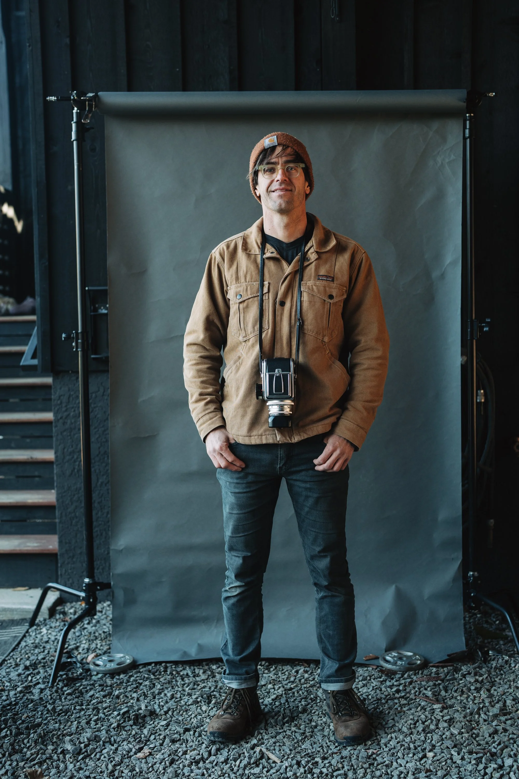 The guy behind the camera—self-portrait of your elopement photographer with a film camera, here for the renegade stuff.
