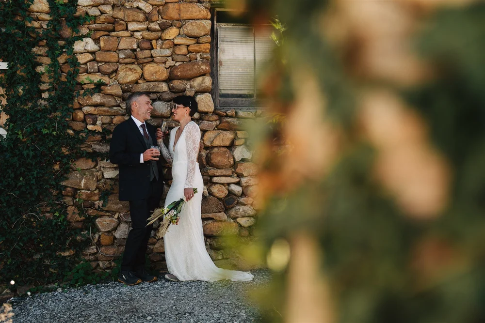 Couple preparing for a sunset hike elopement in the mountains
