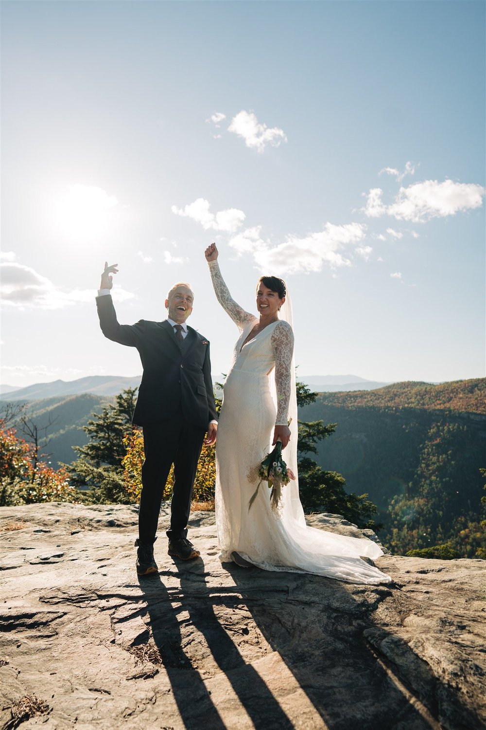 Bride and groom sharing a quiet moment during their mountain elopement