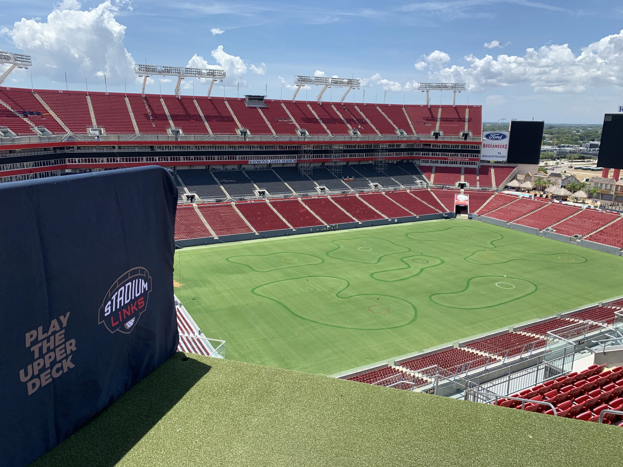 The field is seen from above in the stands. 