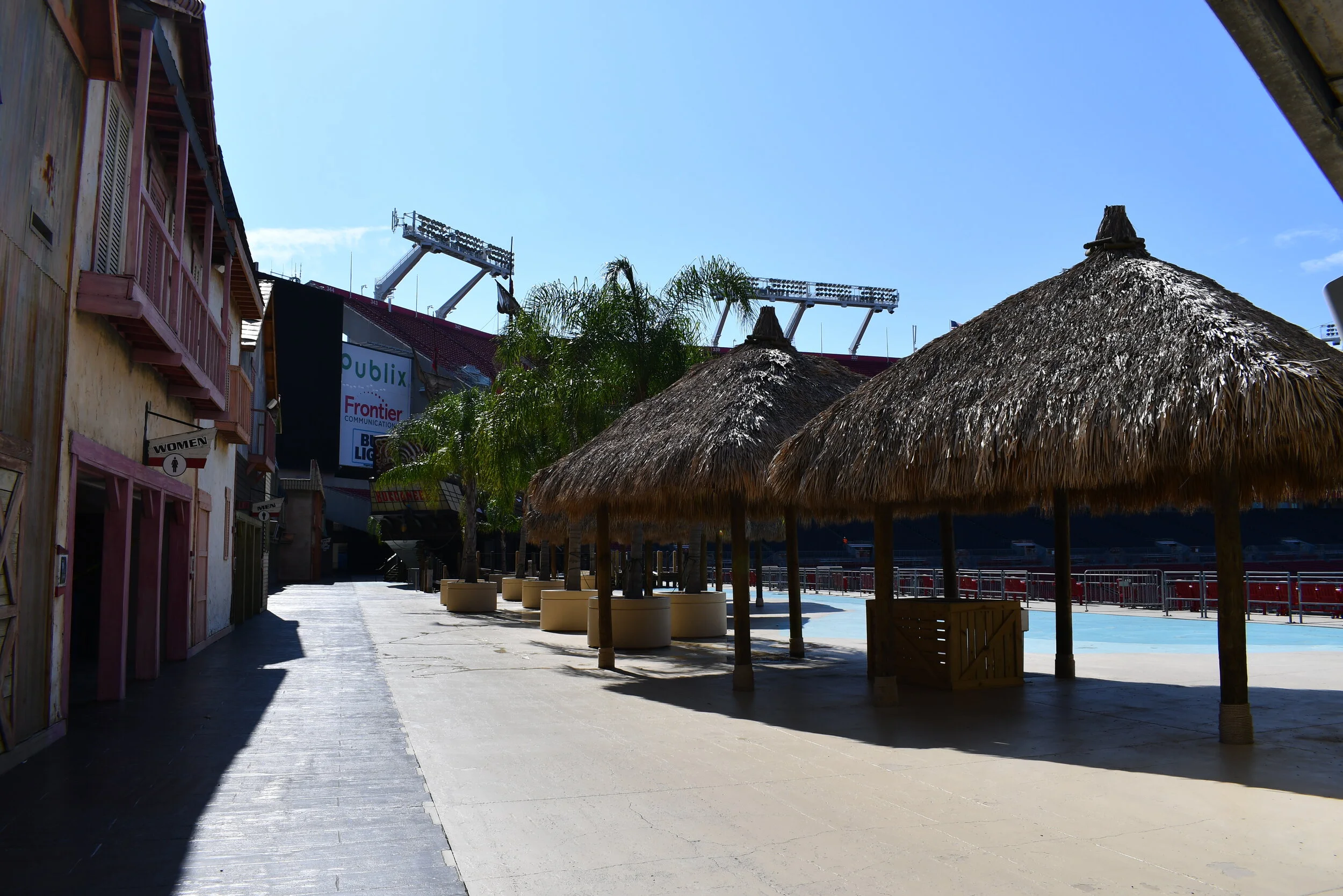 Grass umbrellas provide shade for guests at Buccaneer Cove.