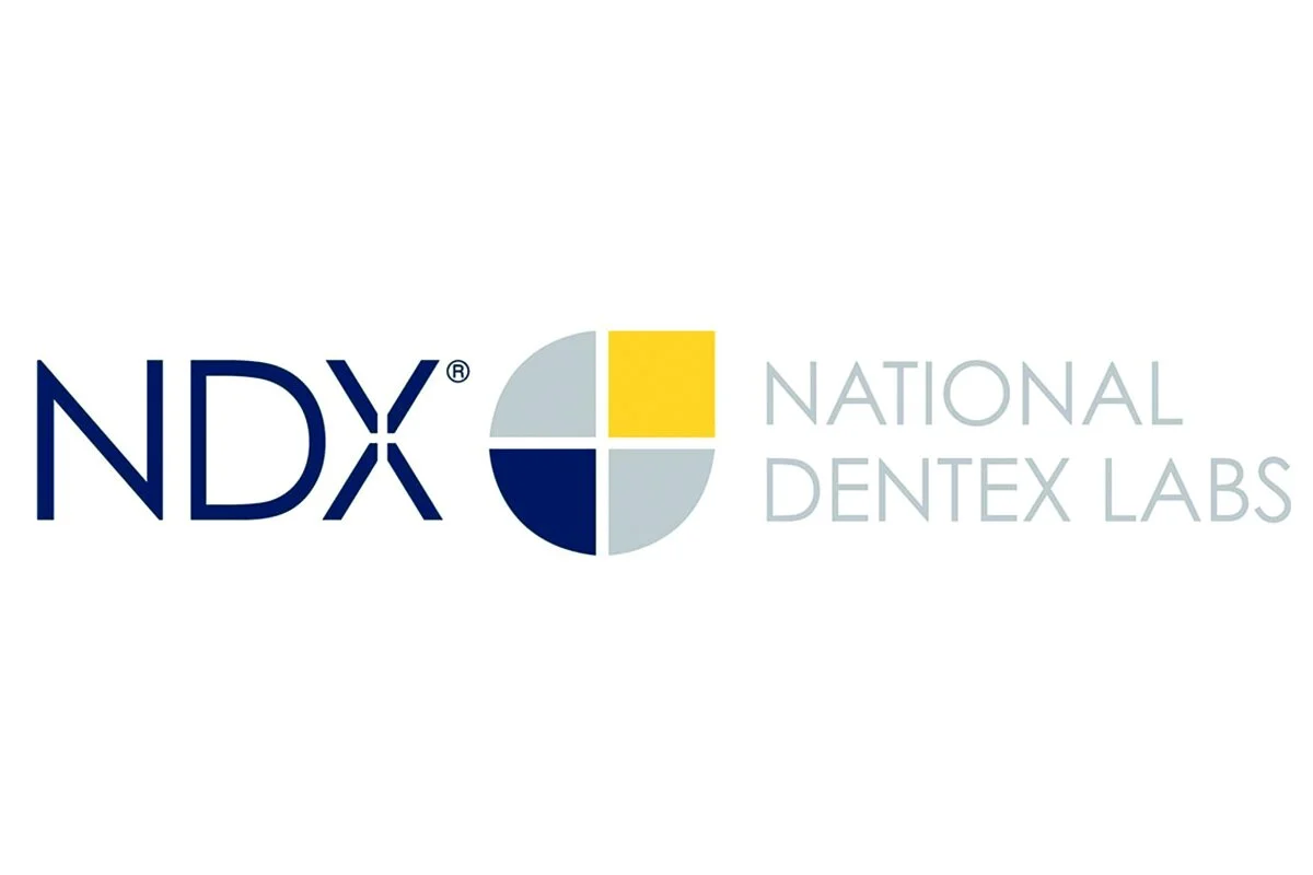 Logo of NDX National Dentex Labs with a four-part divided circle in blue, yellow, and gray colors, and the text 'NDX' and 'National Dentex Labs' in gray.