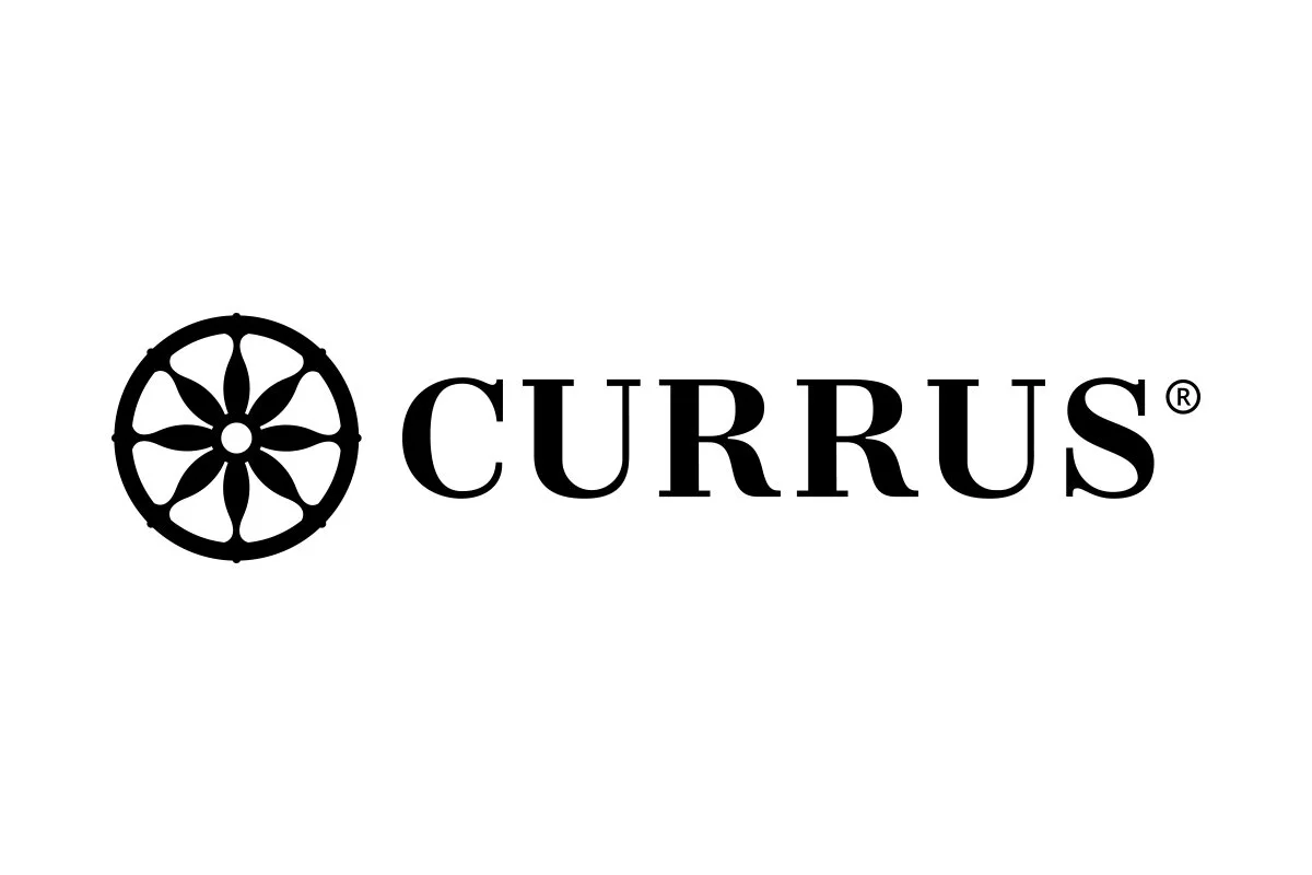 Currus logo featuring a circular wheel-like symbol with eight spokes and the word 'Currus' in black text.