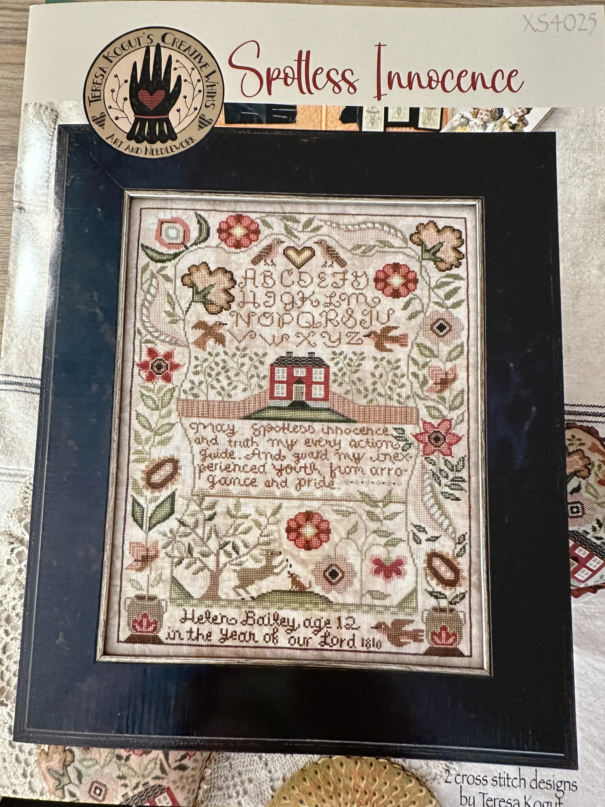 spotless innocence with folk floral heart.jpeg