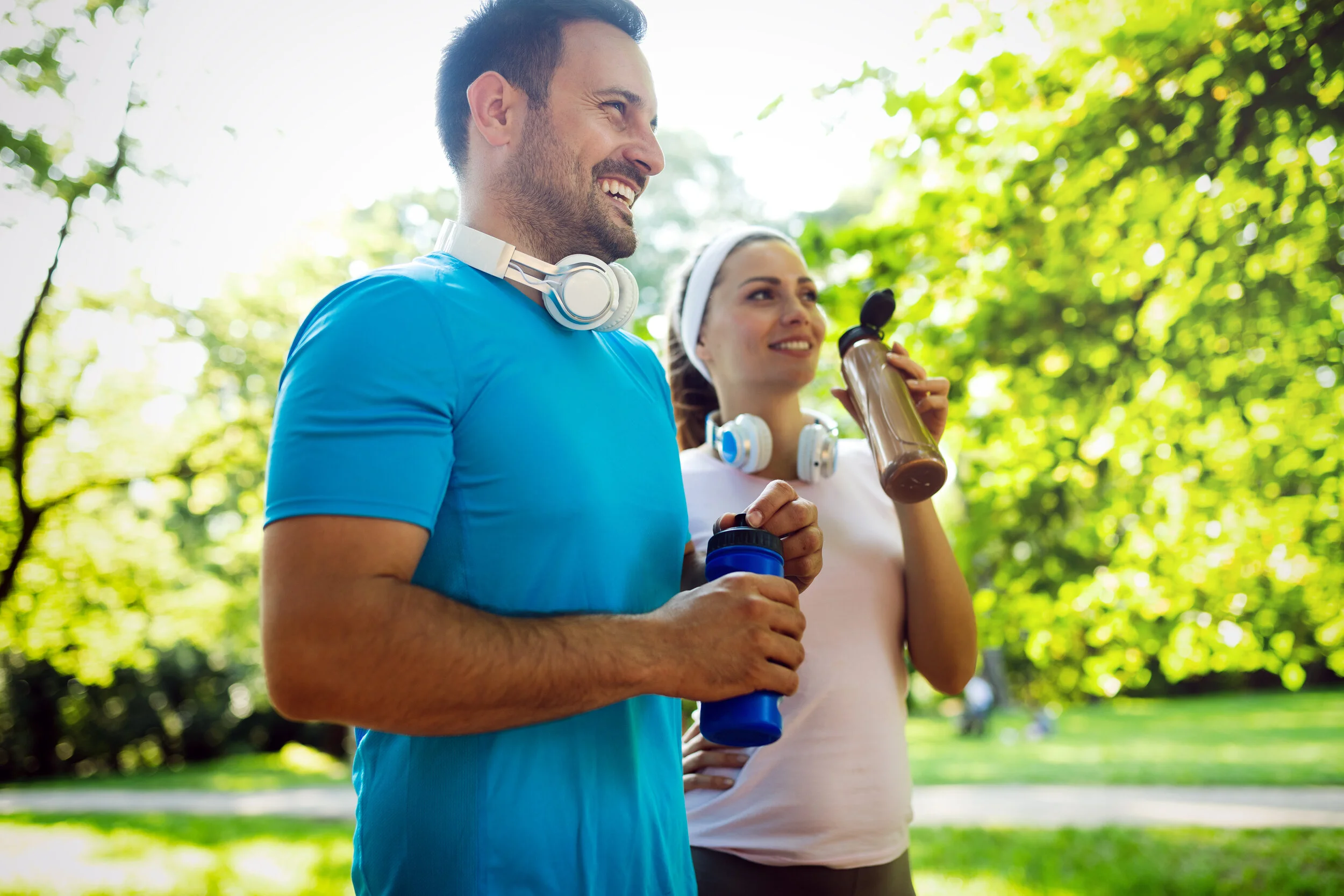 young-people-running-outdoors-couple-or-friends-W8L4PH6.jpg