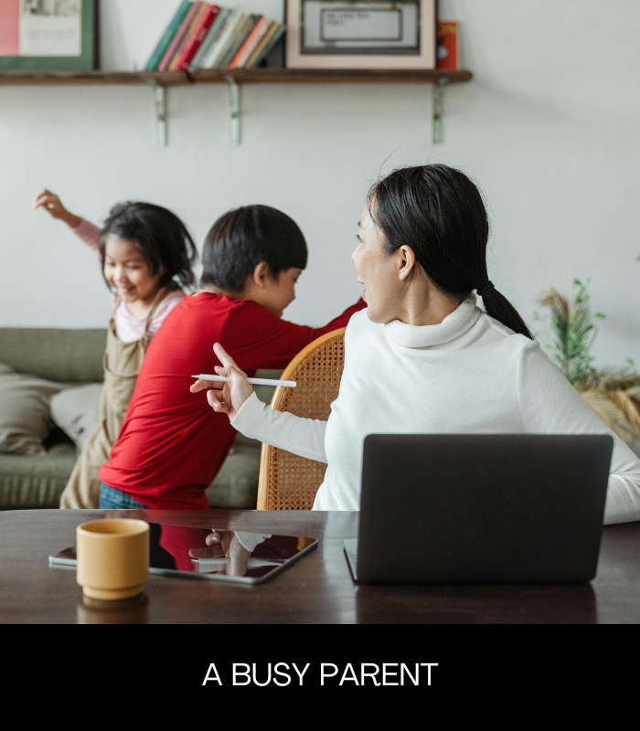 A busy parent working from home