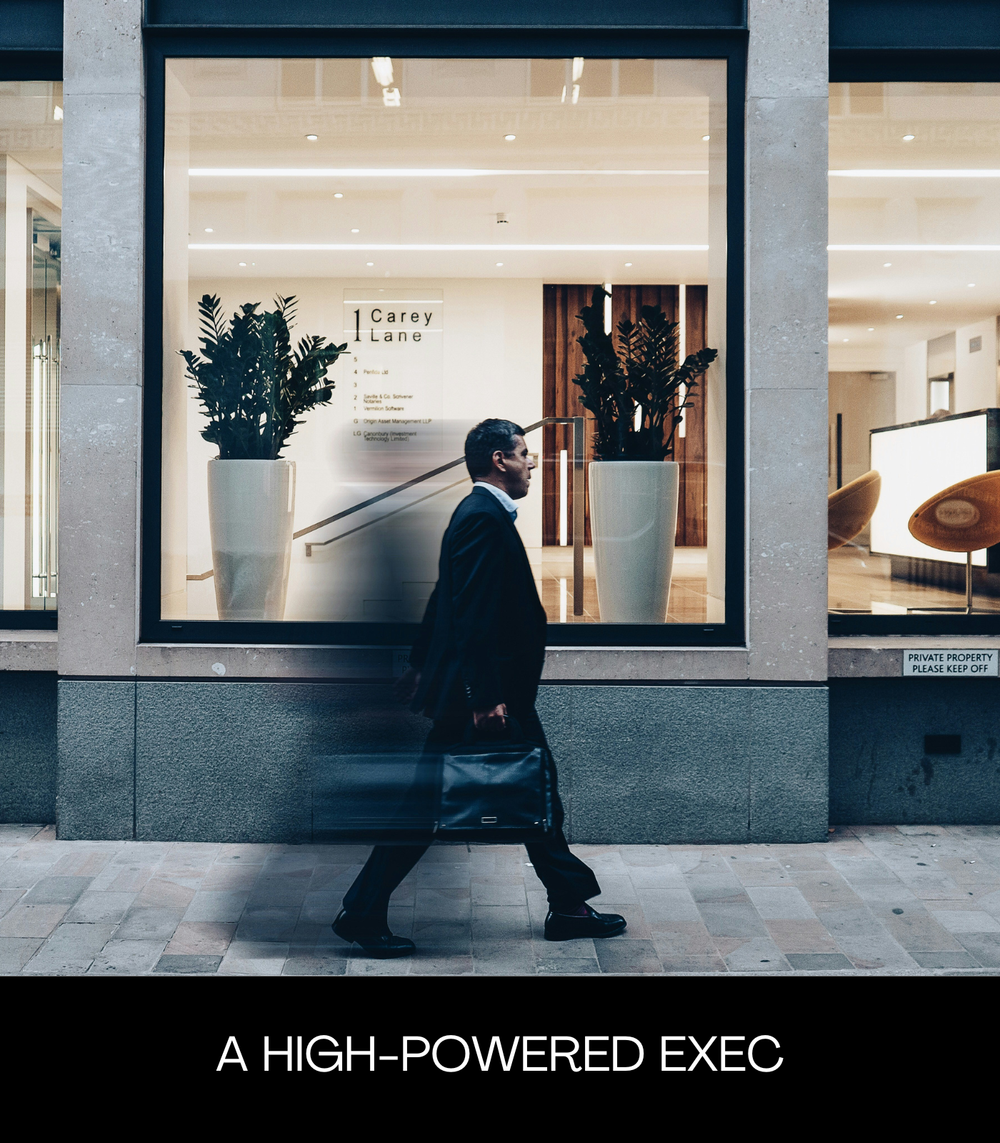 A high-powered executive walking in the city