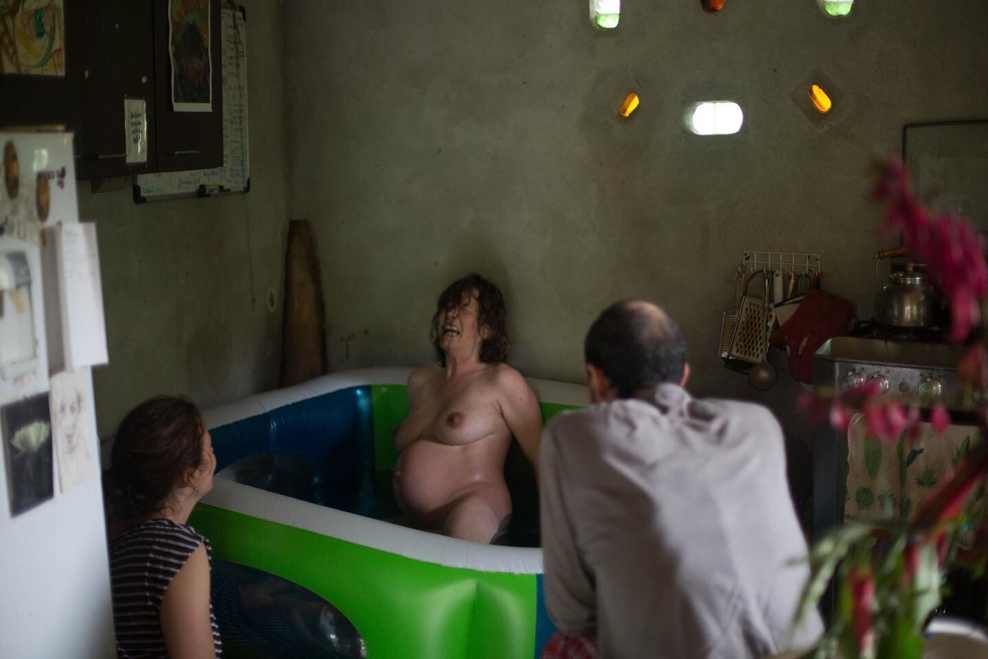 power. love. work. this is birth. raw. intense. this is life. in her body, in her kitchen, this woman brought her son from water, to air. i have never seen anything more awesome. this much power and vastness and strength and light inside this one wom