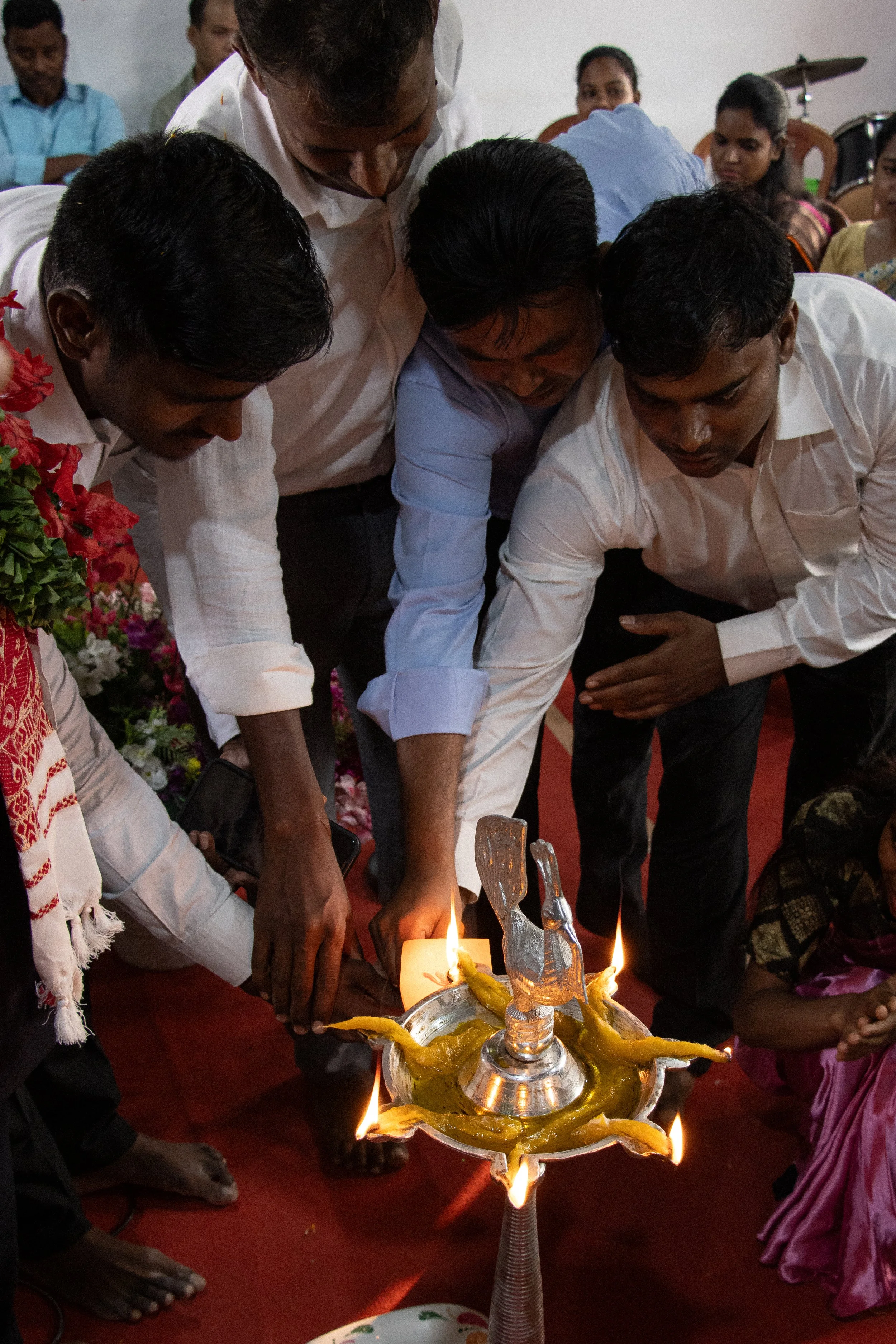  Alumni and students of the SOE near Dhanbad, Jharkhand light a lantern representing their witness to the unreached villages in their area. 