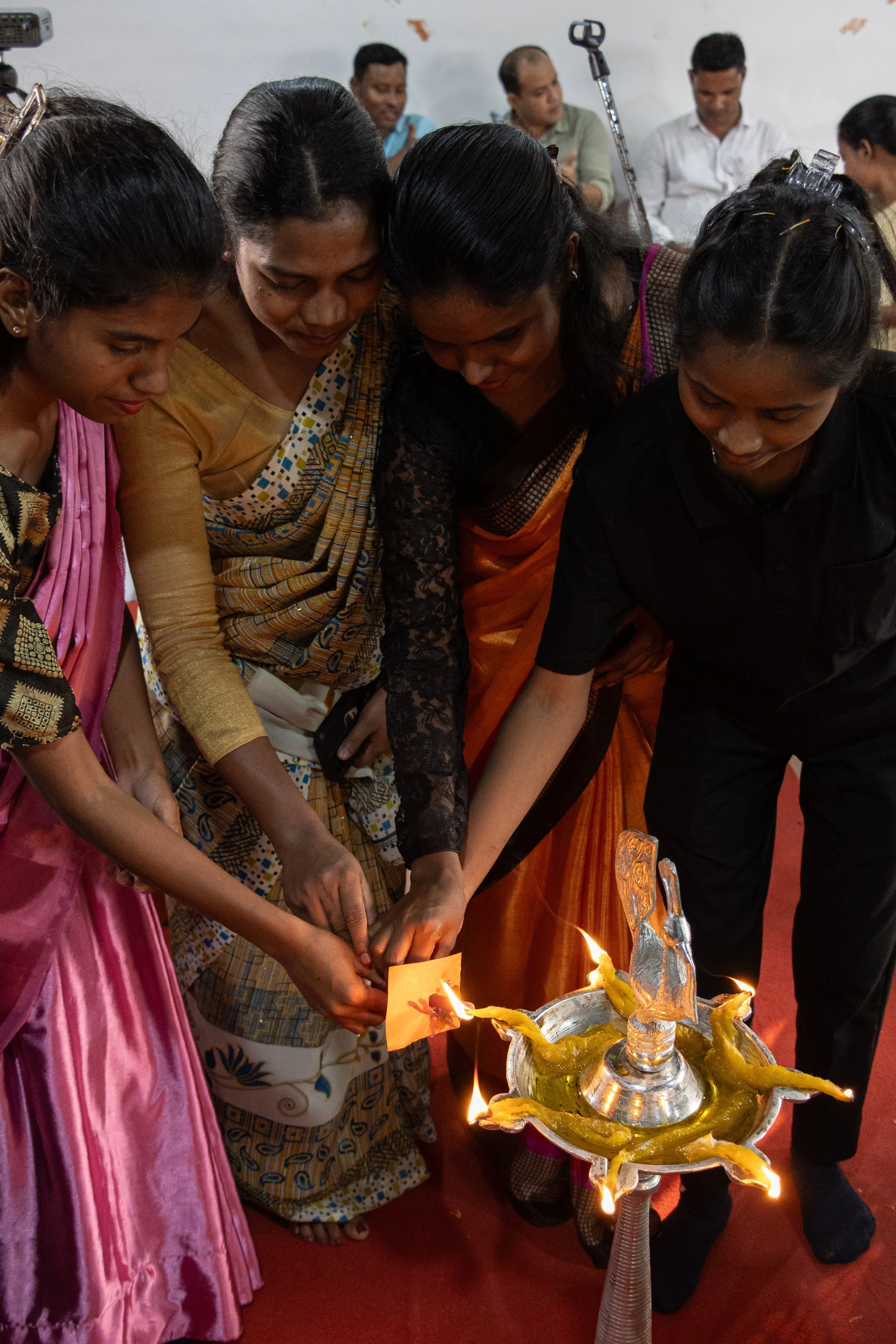  Alumni and students of the SOE near Dhanbad, Jharkhand light a lantern representing their witness to the unreached villages in their area. 