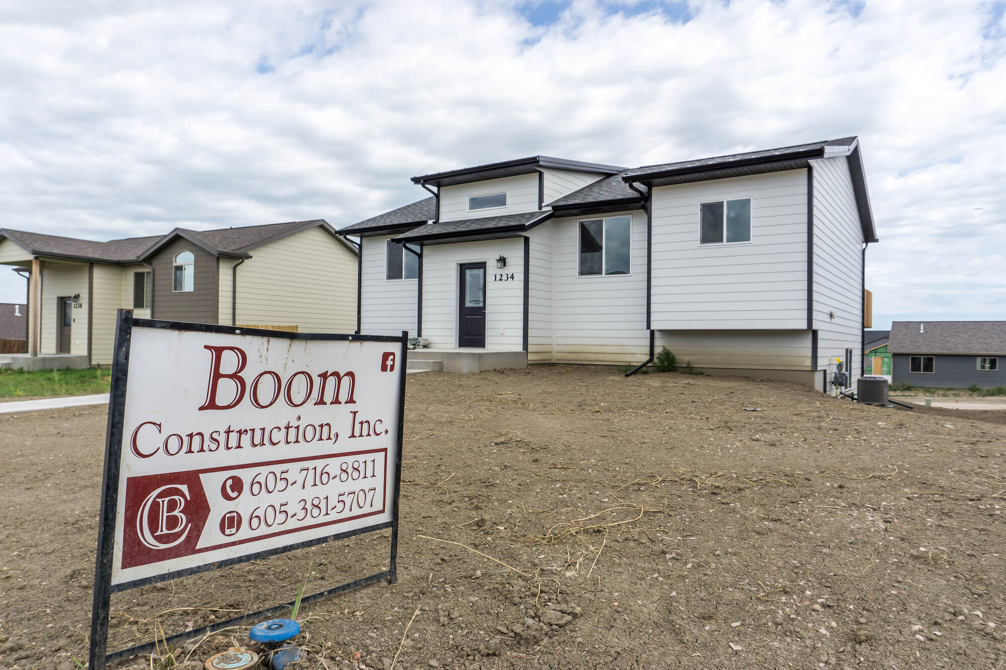 Black and White Home by Boom Construction in Box Elder