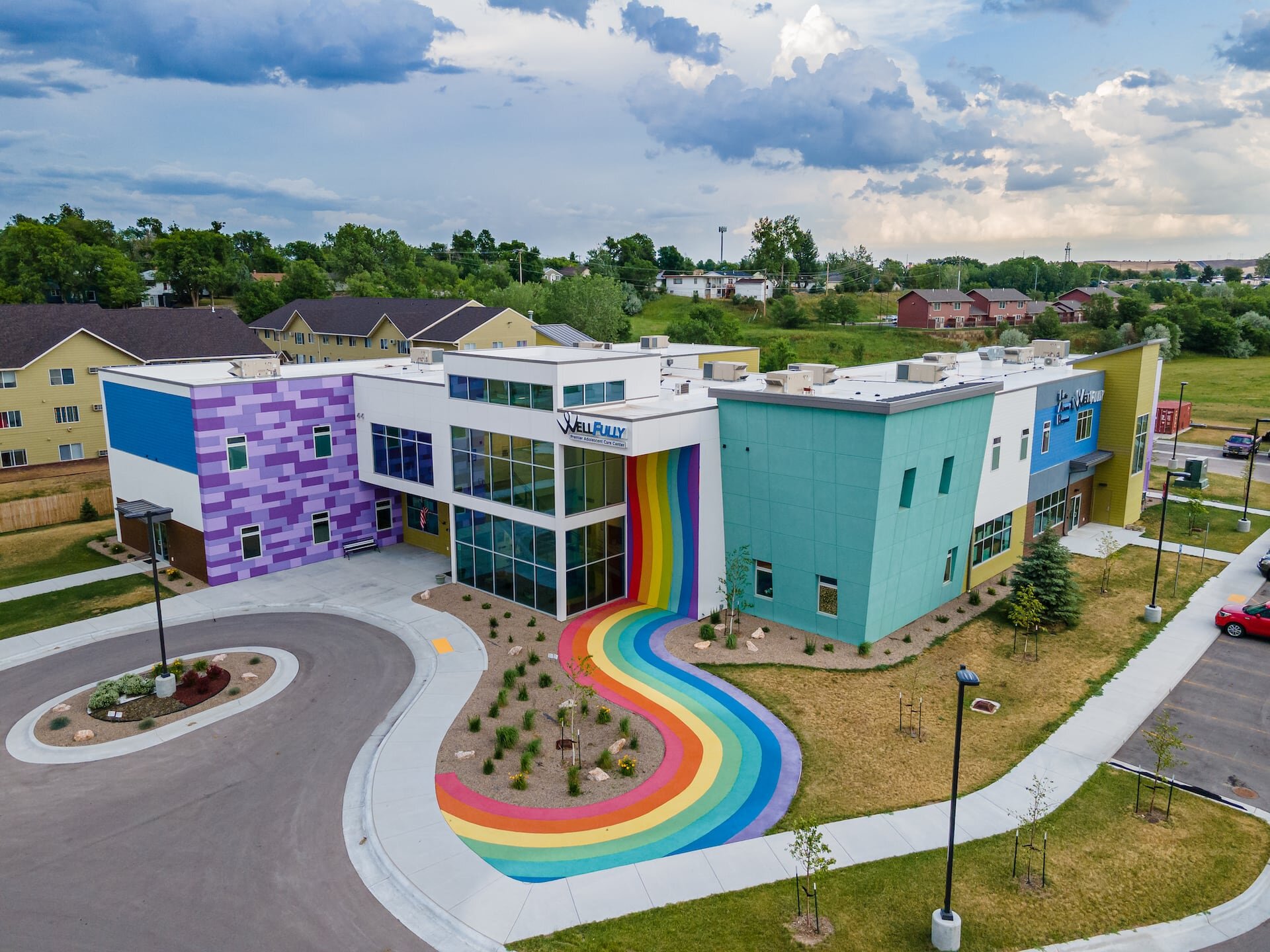 Bright and Cheerful WellFully Building by Black Hills Exteriors