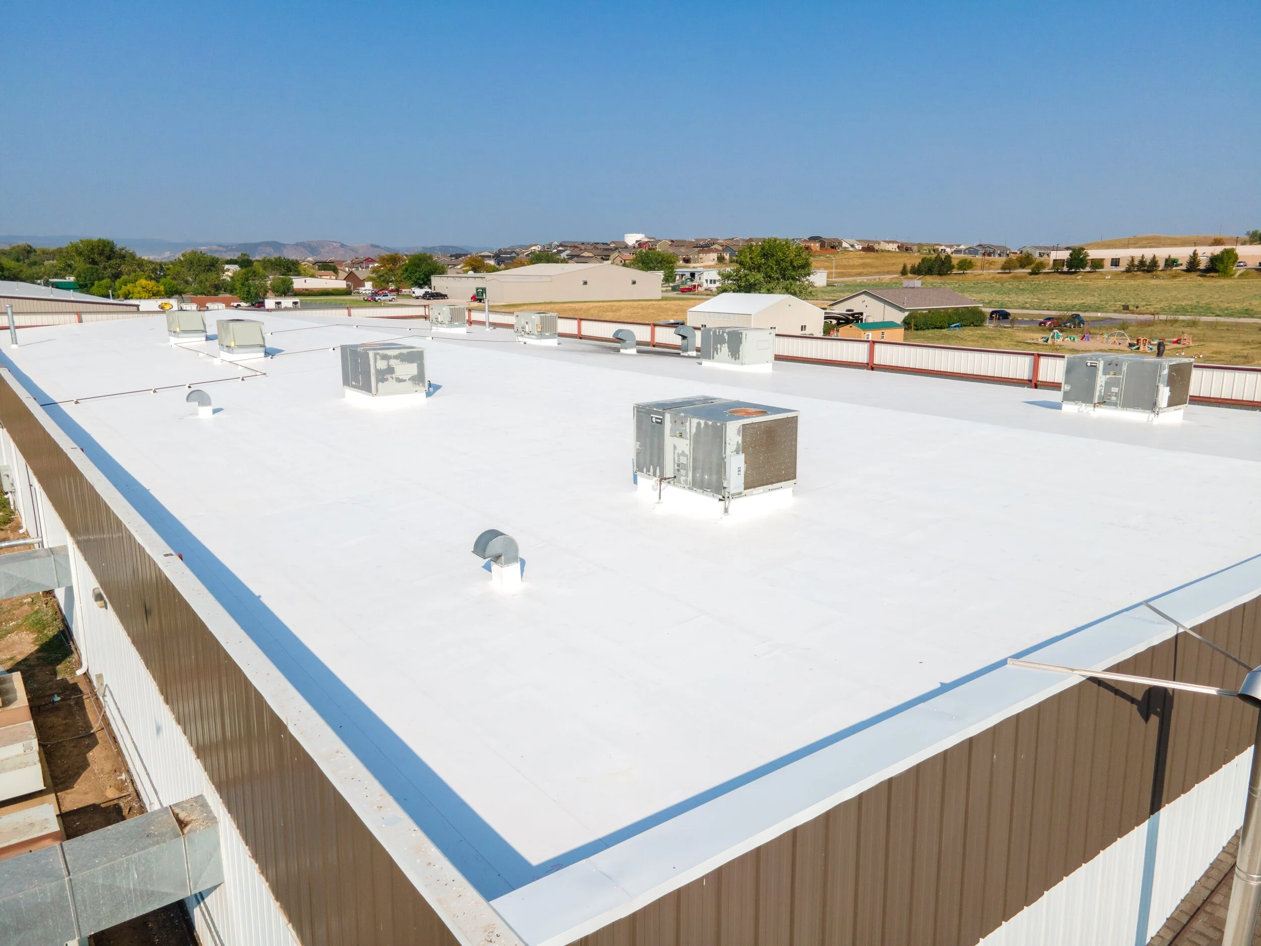 Metal to PVC Roof Conversion by Black Hills Exteriors 