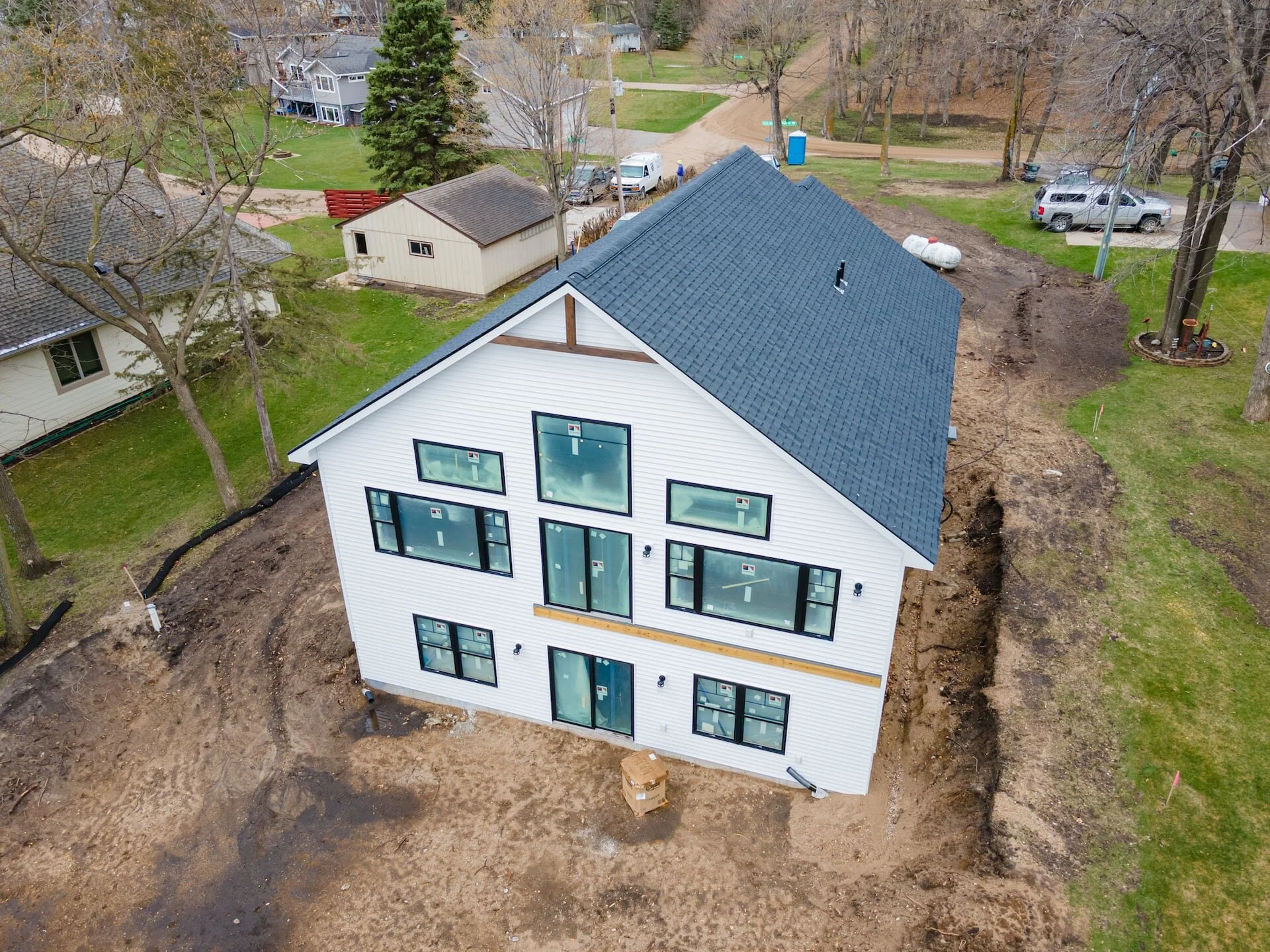 Black and White Lakefront Home by Builders — Builders FirstSource