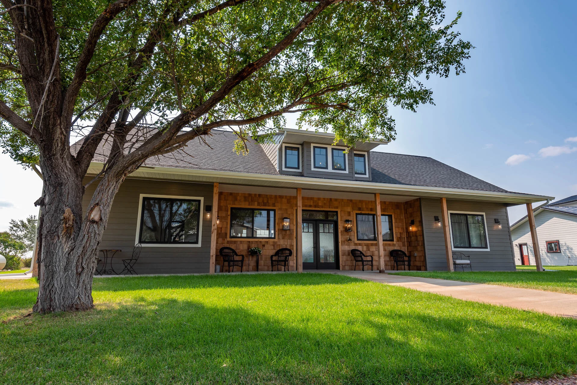 Farmhouse Style Meets Lake House Living by TWC Construction