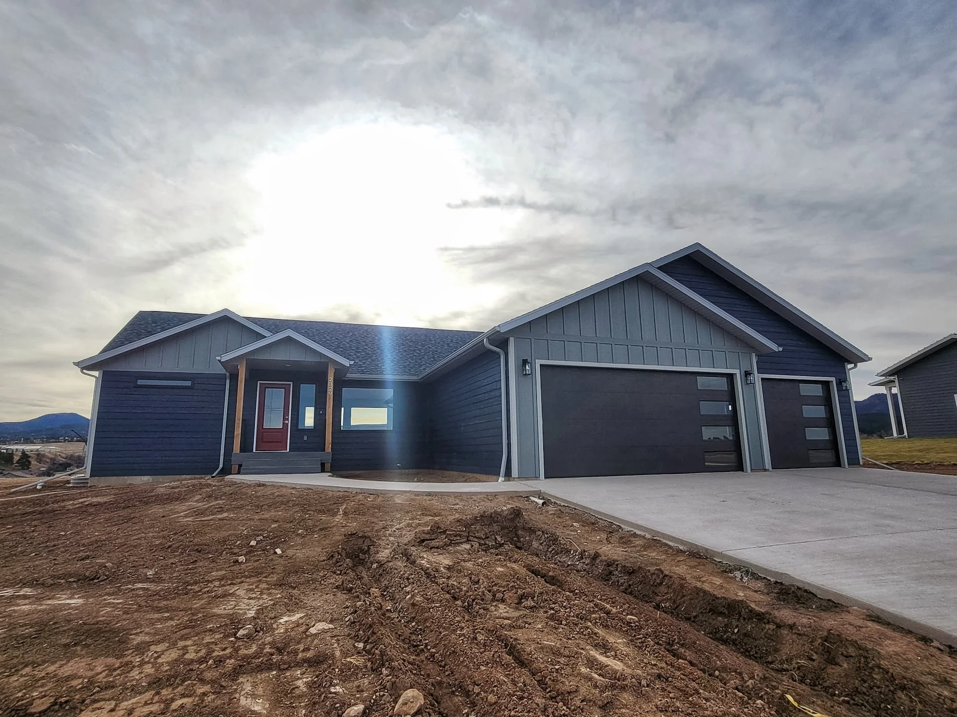 Custom Home in The Timbers by High Plains Construction — Builders