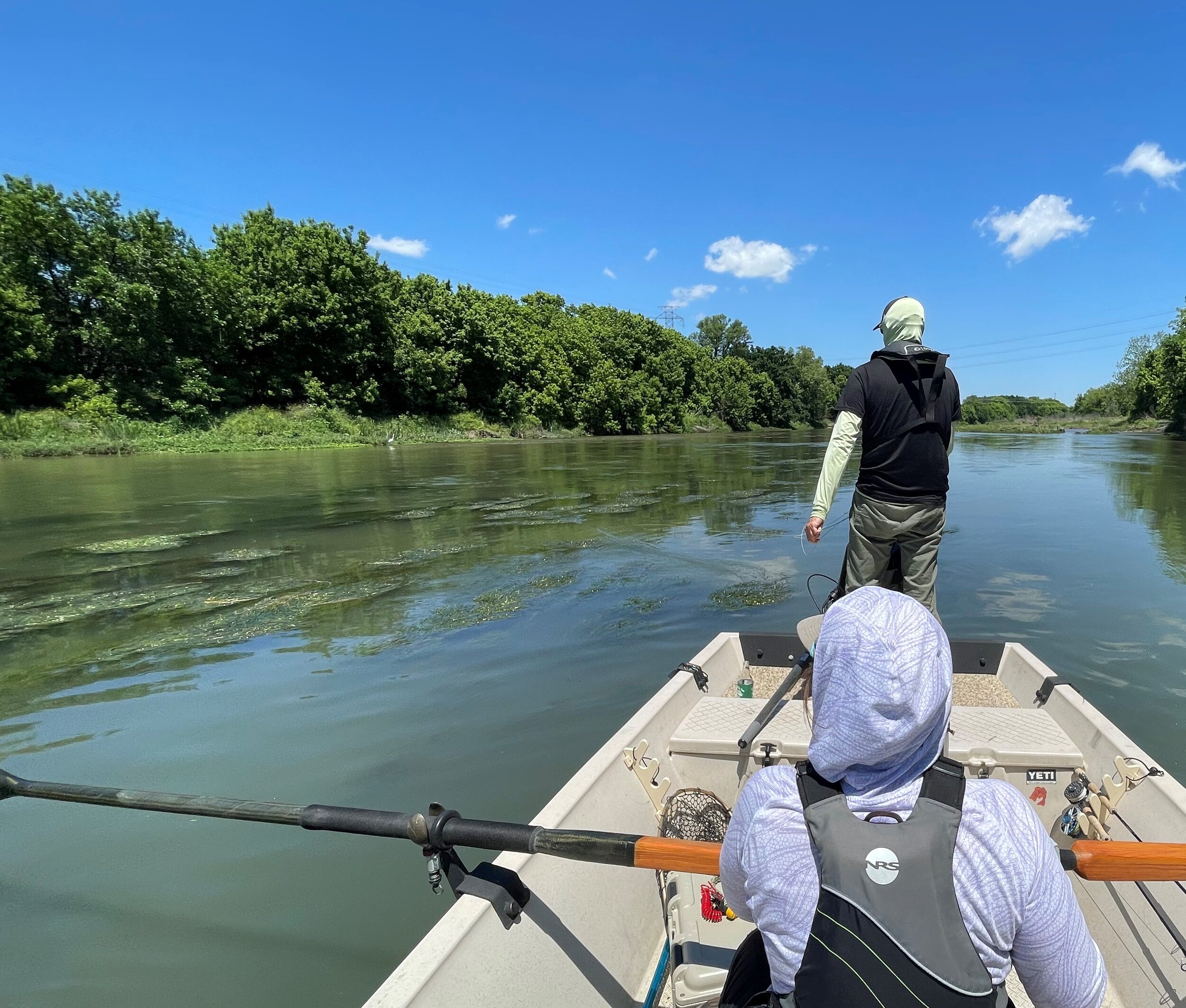 Volunteers on the water during the LoCo Trash Bash river cleanup