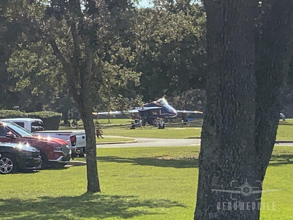 Blue Angels F/A-18 Hornet sitting outside the museum entrance.