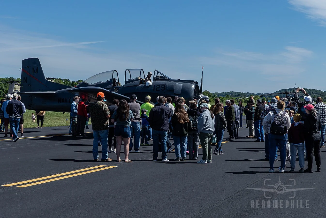 The arrival of Neal Melton from the Tennessee Museum of Aviation in his T-28B Trojan drew an instant crowd. Wings & Wheels - Greeneville Municipal Airport (GCY) 
02May26