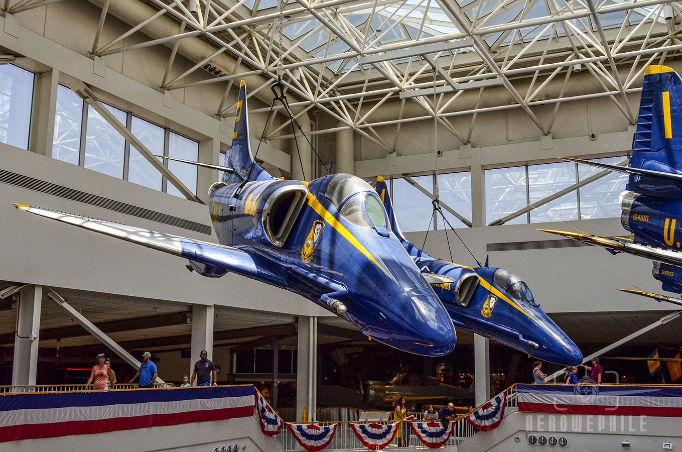 Blue Angels A-4 Skyhawks in the diamond formation suspended in the Blue Angel Atrium.