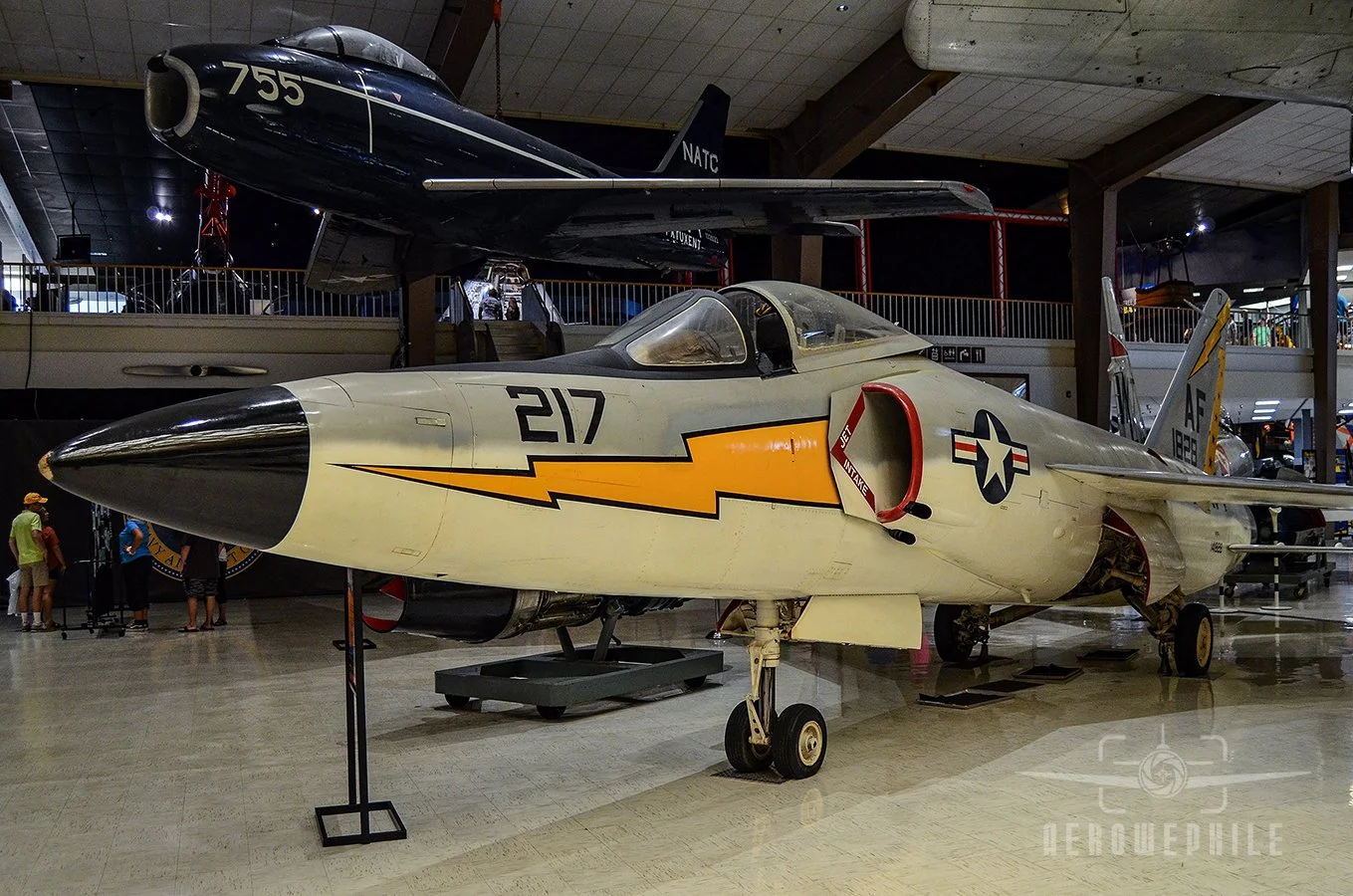 Delivered to the Navy in April 1958, the Museum's F11F-1 (Bureau Number 141828) served with several squadrons, ashore at Naval Air Station (NAS) Cubi Point, Philippines, and with Training Squadron (VT) 26 before flying with the Blue Angels from 1967 