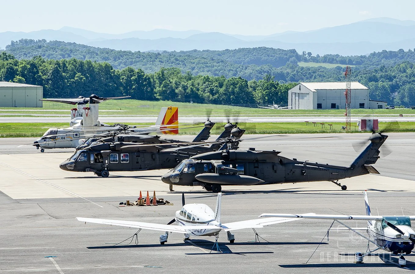Four U.S. Army Sikorsky UH-60M Black Hawks from the 1st Battalion, 147th Aviation Regiment, WI ArNG, Truax Field, Madison, WI parked on the ramp at Tri-Cities Airport. The stranded CMV-22B Osprey remains parked on the Tri-Cities Airport ramp.
04Jun26