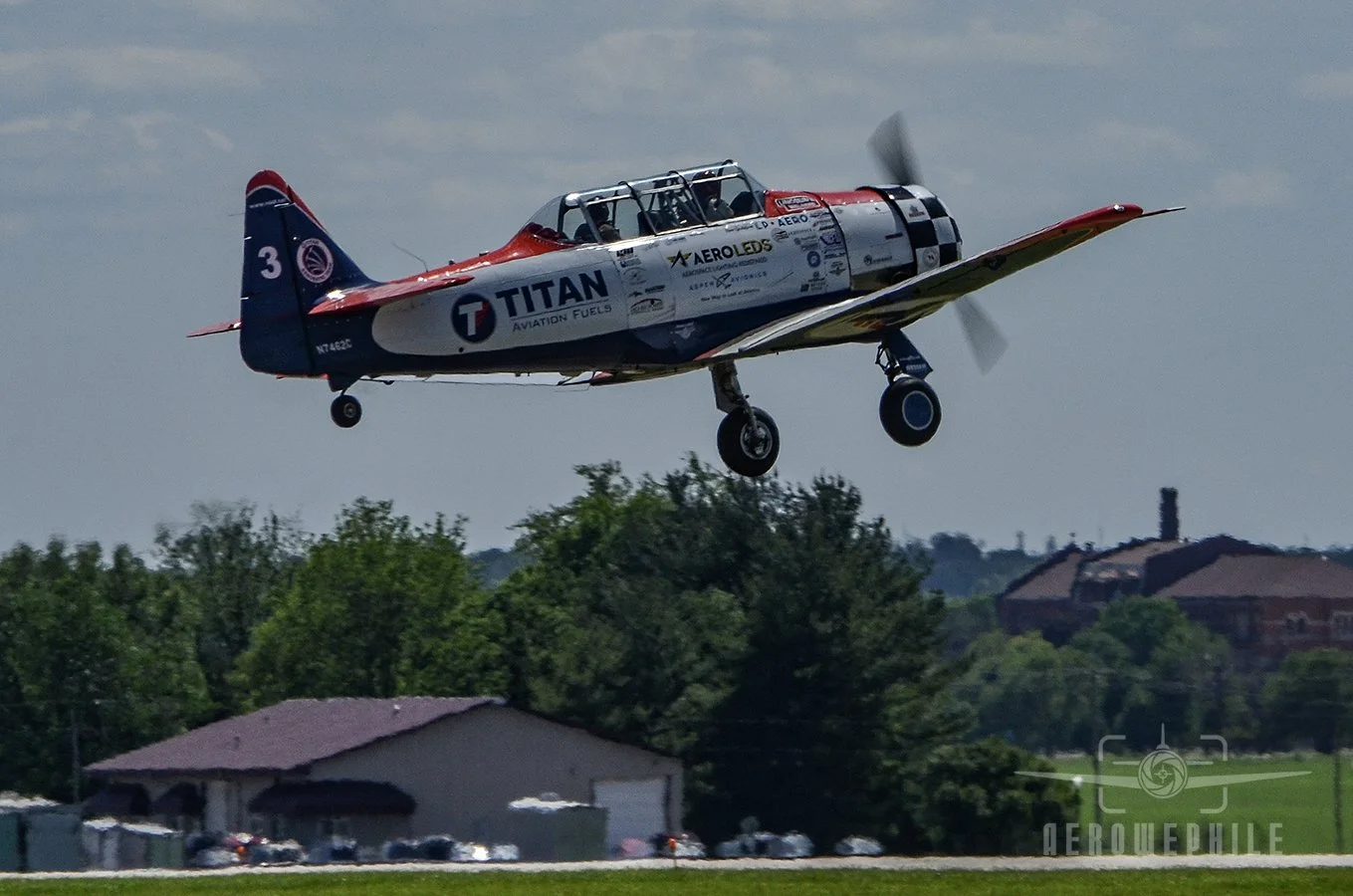 TITAN Aerobatic Team - North American AT-6 Texan taking off.