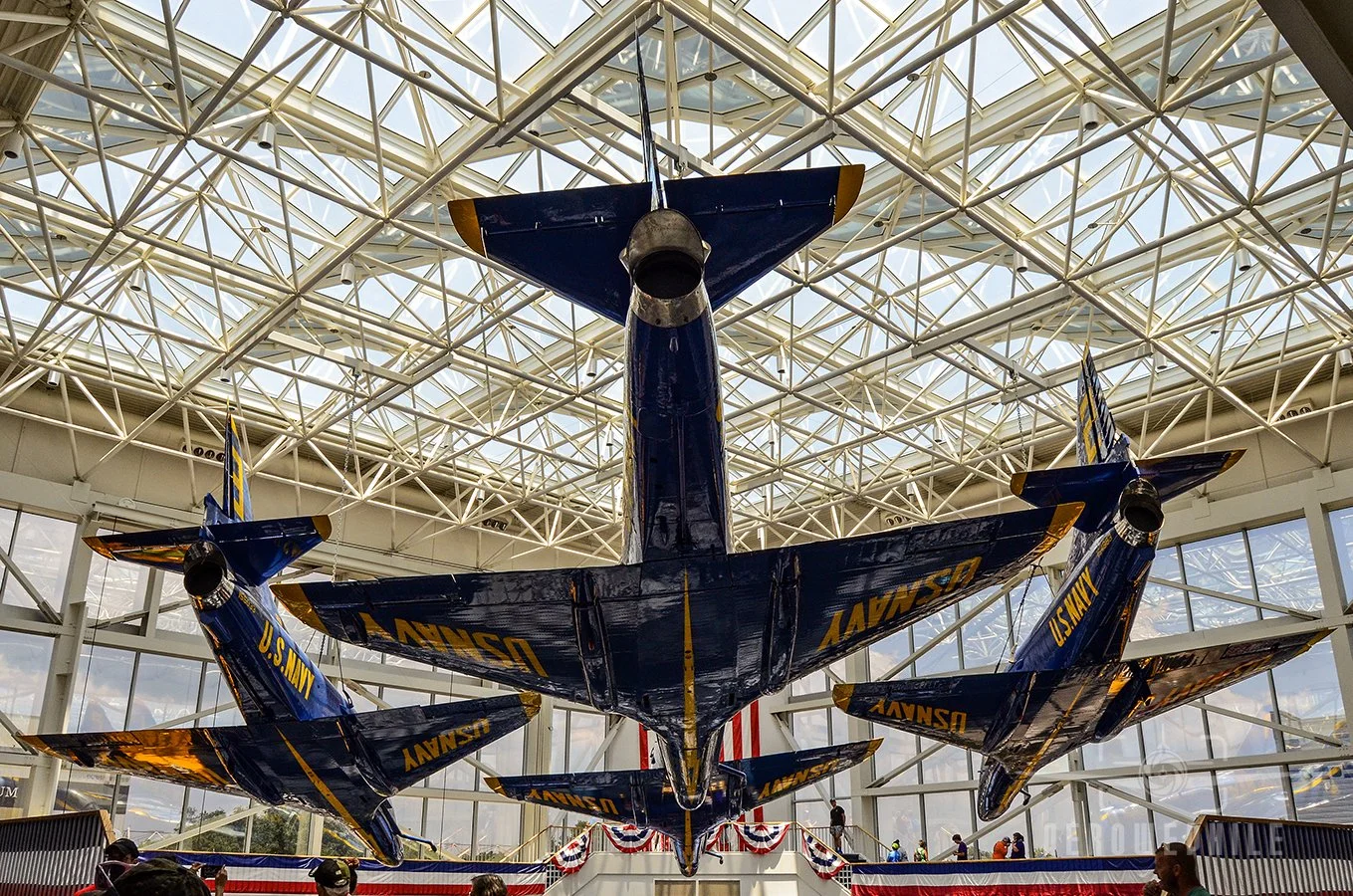 Blue Angels A-4 Skyhawks in the diamond formation suspended in the Blue Angel Atrium.