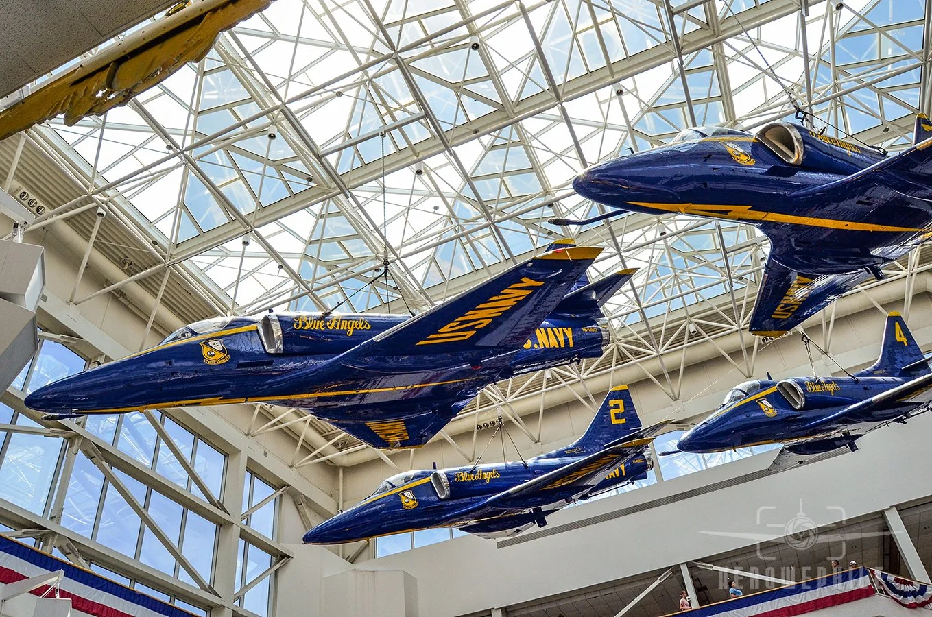 Blue Angels A-4 Skyhawks in the diamond formation suspended in the Blue Angel Atrium.