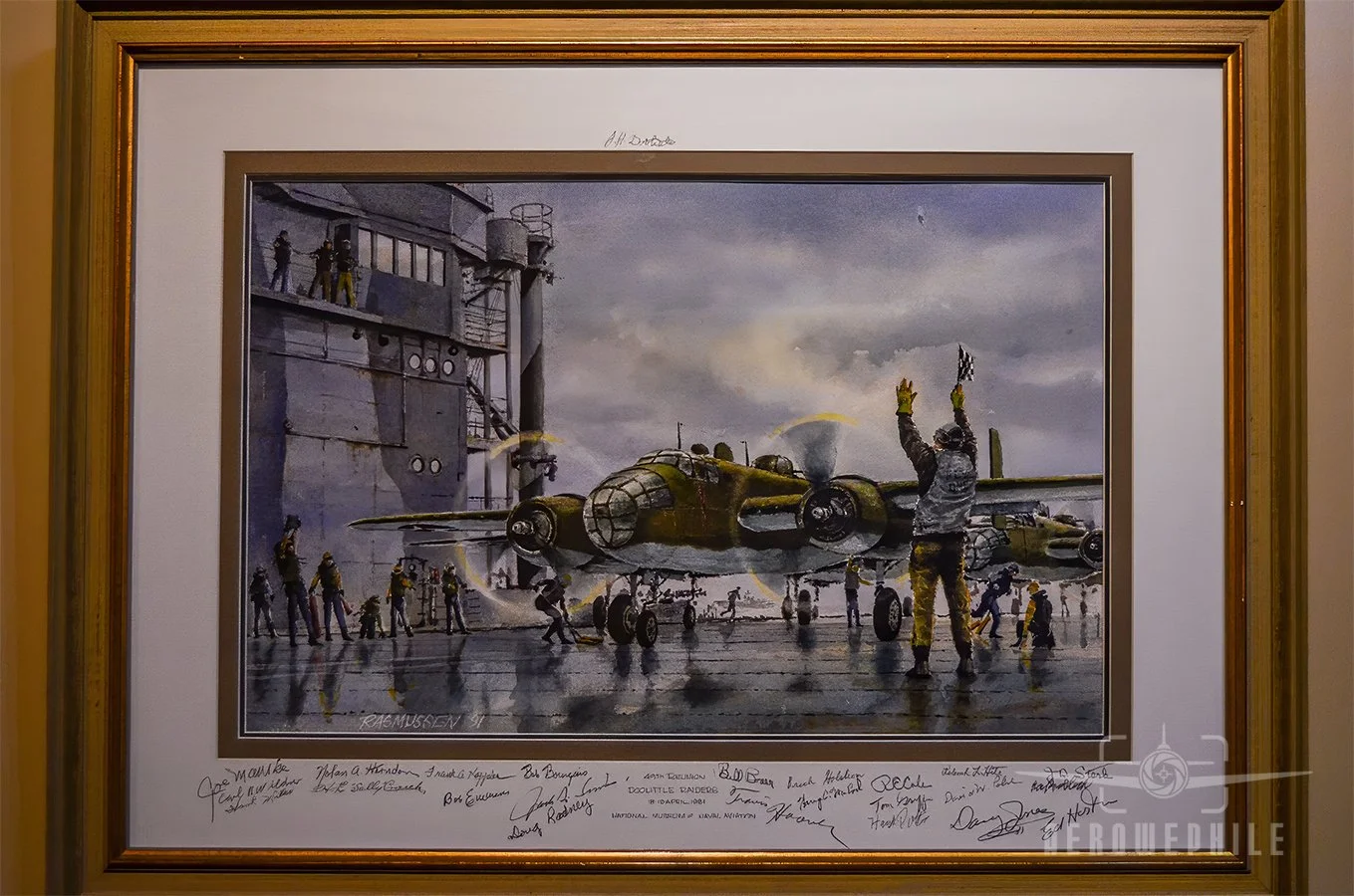 Naval Aviation Art Gallery - Doolittle Raiders with many of the Raiders signatures on the mat frame.