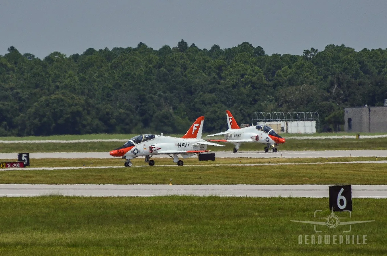 A pair of McDonnell Douglas (now Boeing) T-45 Goshawk taxi in after landing.