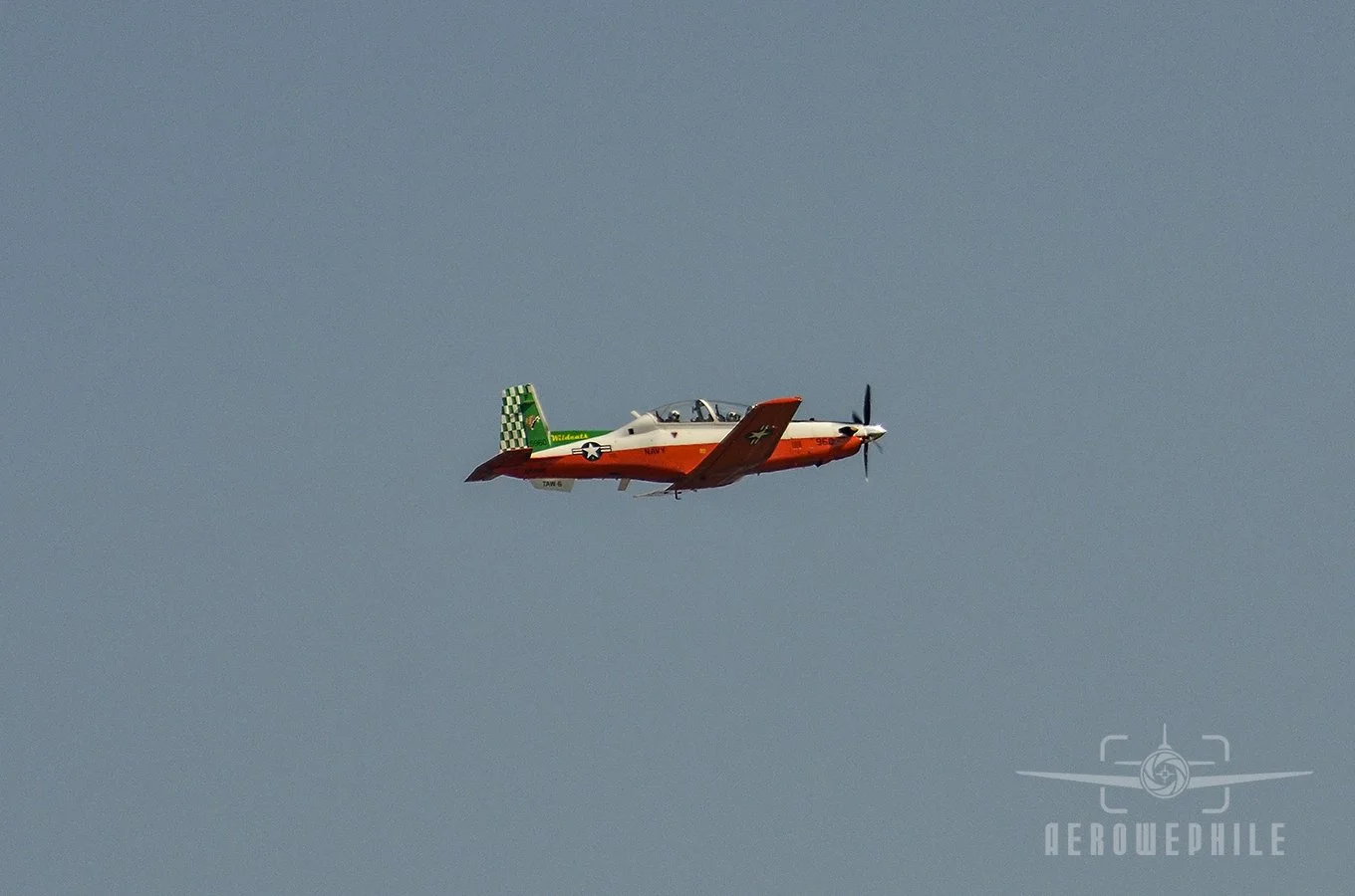 Navy Beechcraft T-6 Texan II out for a morning training session. Note the special livery on the Texan's tail - Wildcats TAW-6.