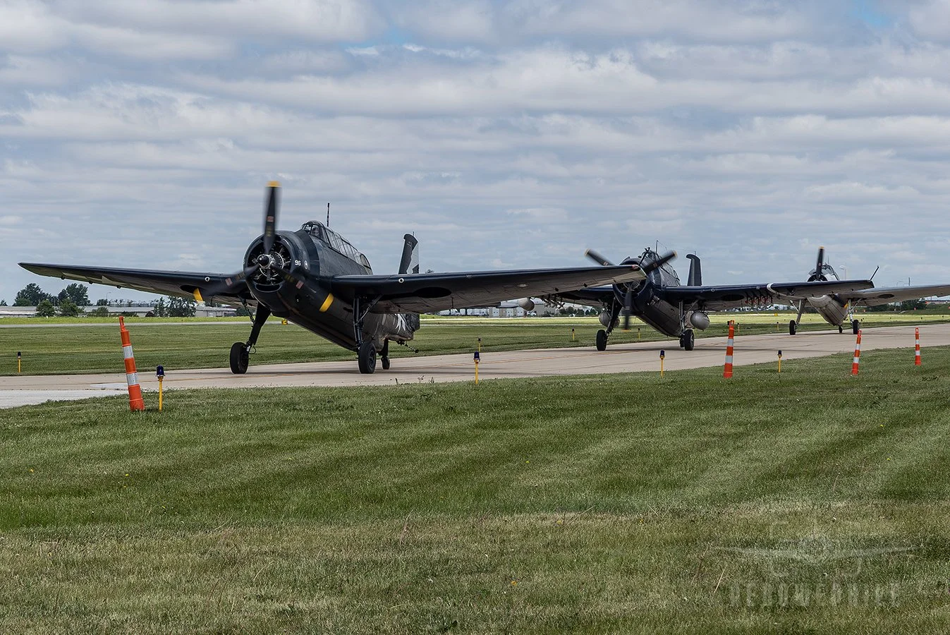TBM-3E Avengers taxi out for take off.