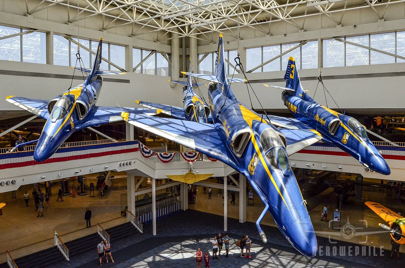 Blue Angels A-4 Skyhawks in the diamond formation suspended in the Blue Angel Atrium.