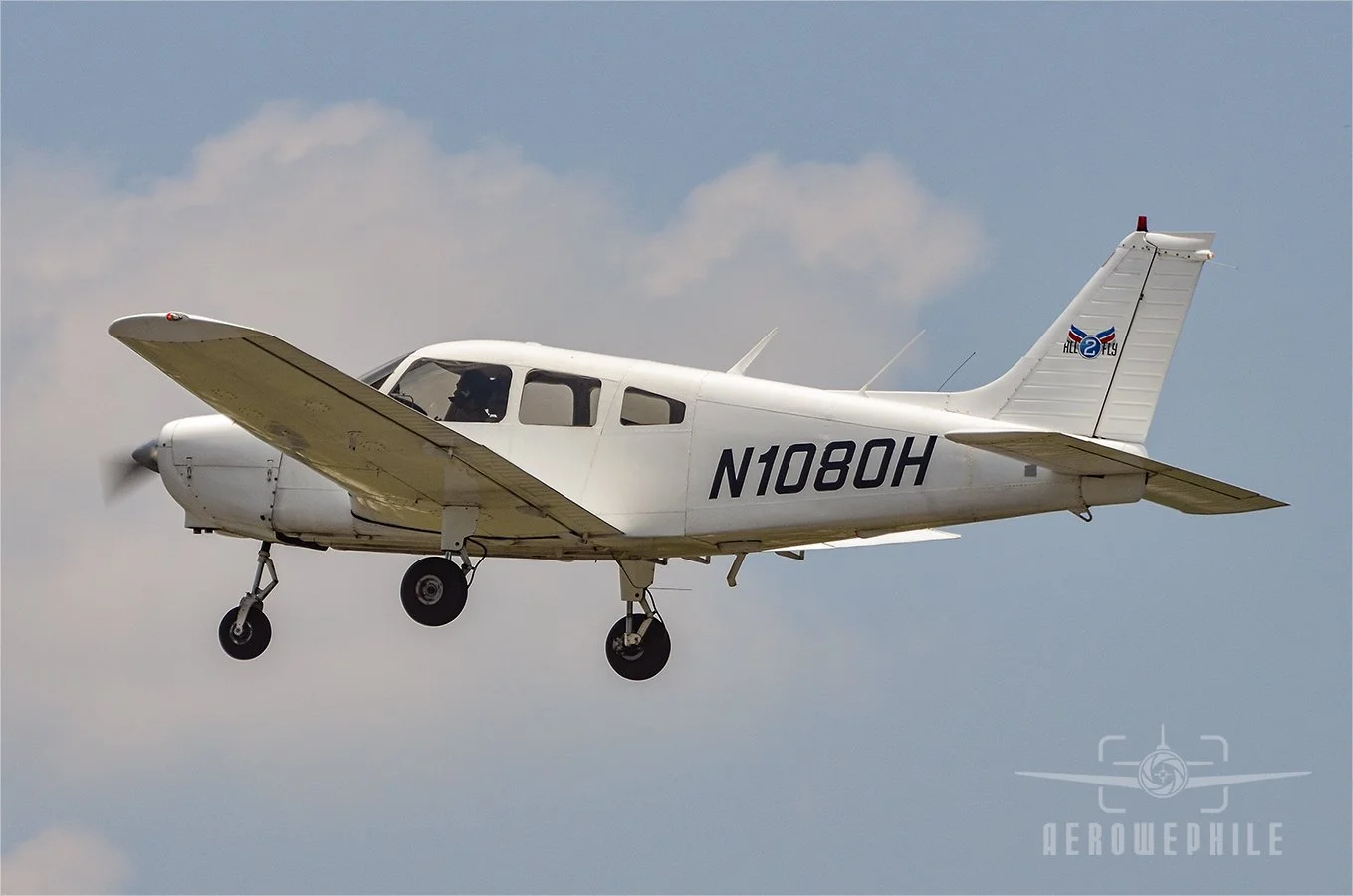 Piper PA-28-151 Cherokee Warrior taking off.