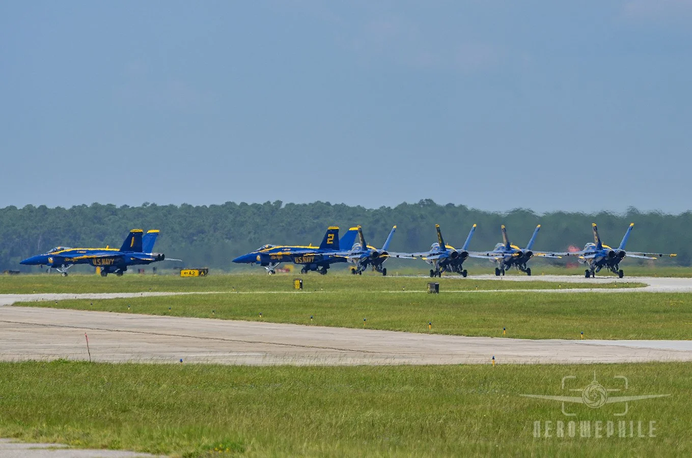 Blue Angels taxi in after the completion of their display.