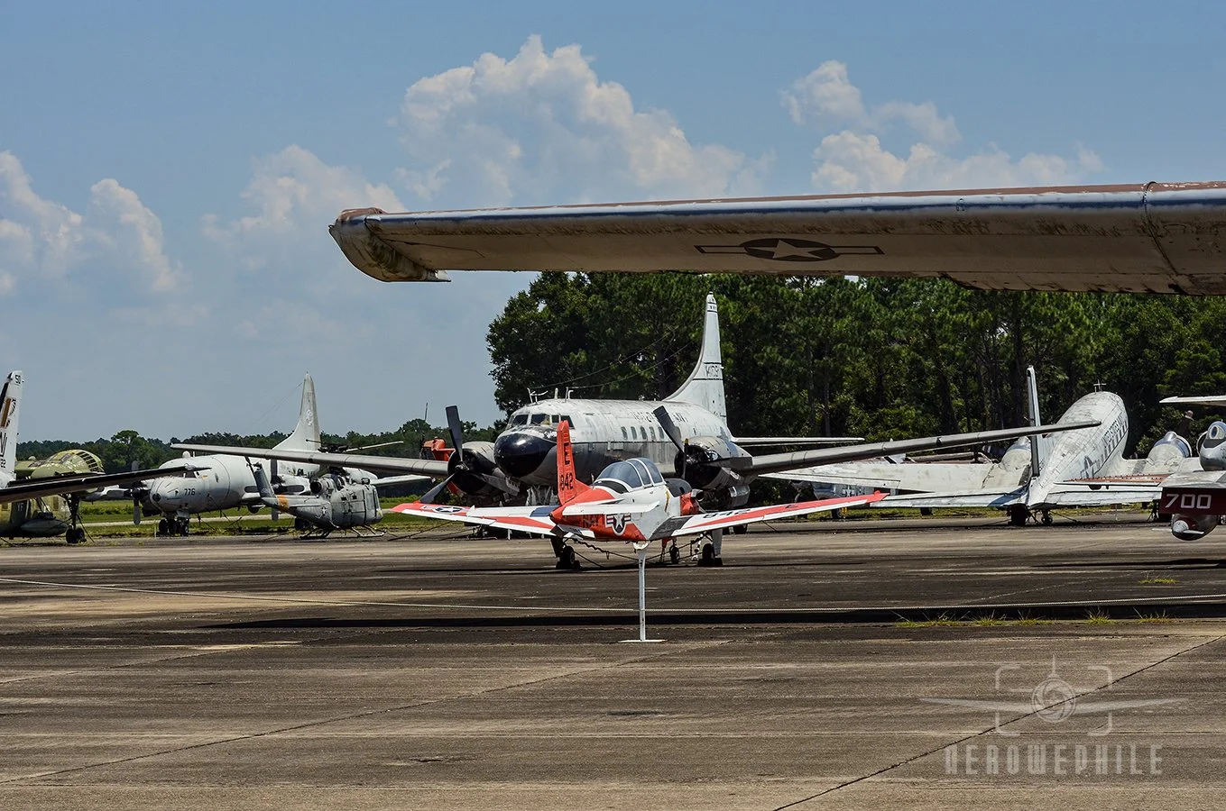 T-34C Turbomentor, Convair C-131F (R4Y-2) Samaritan, Douglas R4D Skytrain,  P-3 Orion, and UH-1 Huey.