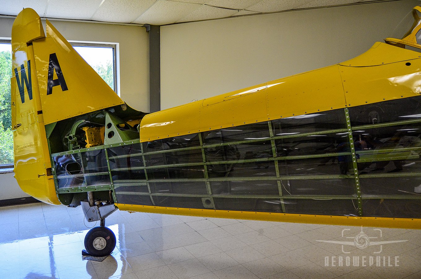 SNJ Cutaway - Two generations of Naval Aviators trained in the SNJ, and a number of aviators made their first carrier landings in the aircraft. This "cutaway" SNJ reveals the inner workings of the aircraft to Museum visitors.

