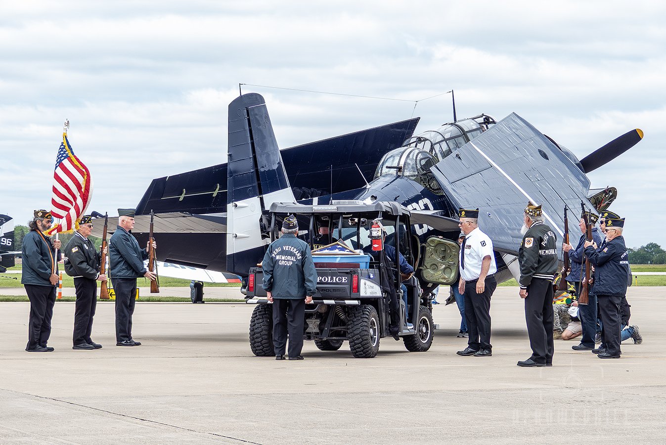 TBM-3E Avenger being loaded with Veterans artifacts before flight.