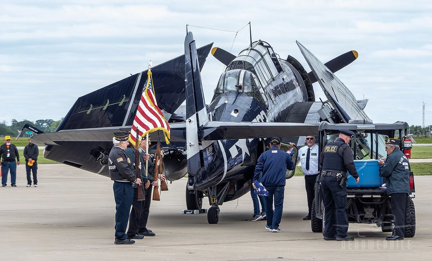TBM-3E Avenger being loaded with Veterans artifacts before flight.