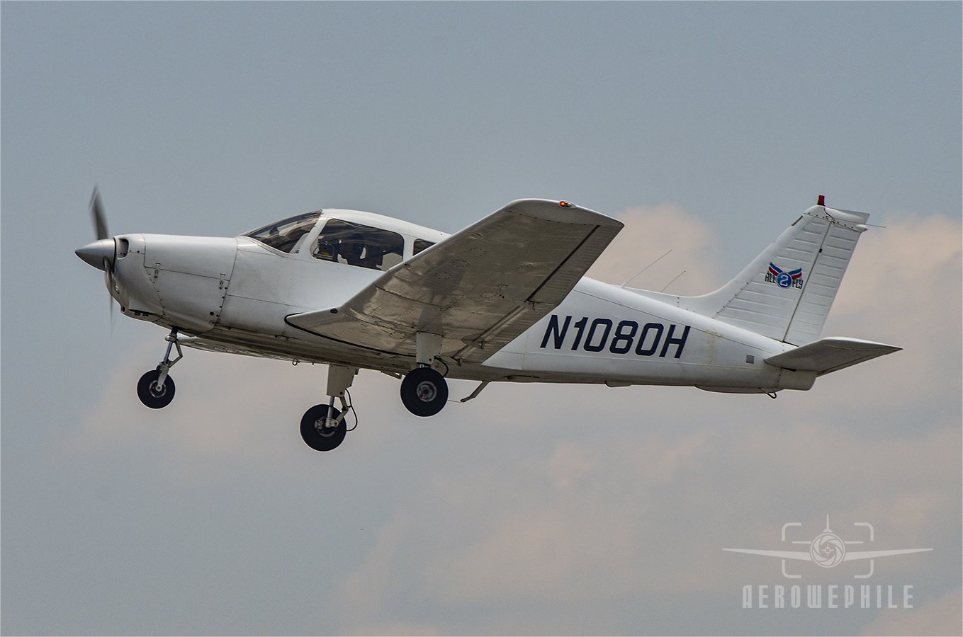 Piper PA-28-151 Cherokee Warrior taking off.